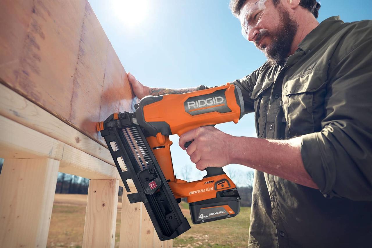 Handheld power drill, Pneumatic tool, Sky, Vehicle, Workwear, Plant
