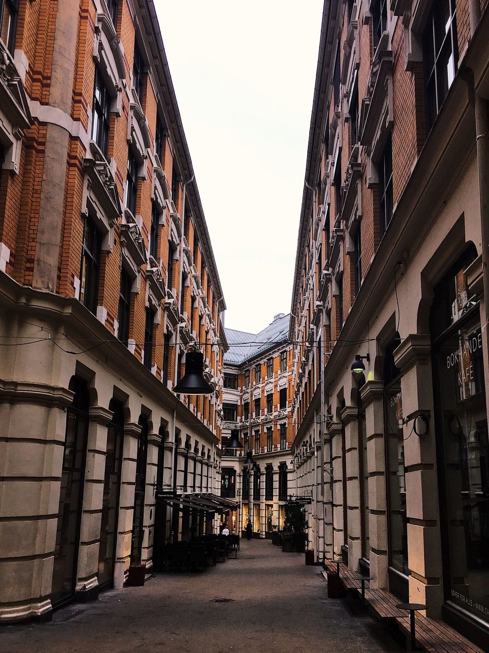 Road surface, Sky, Window, Building, Neighbourhood, Alley, Symmetry