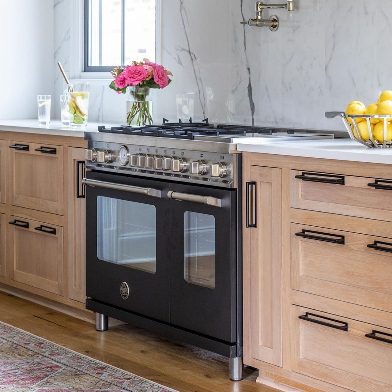 Countertop, Cabinetry, Furniture, Table, Property, Flower, Kitchen, Building, Tap, Drawer