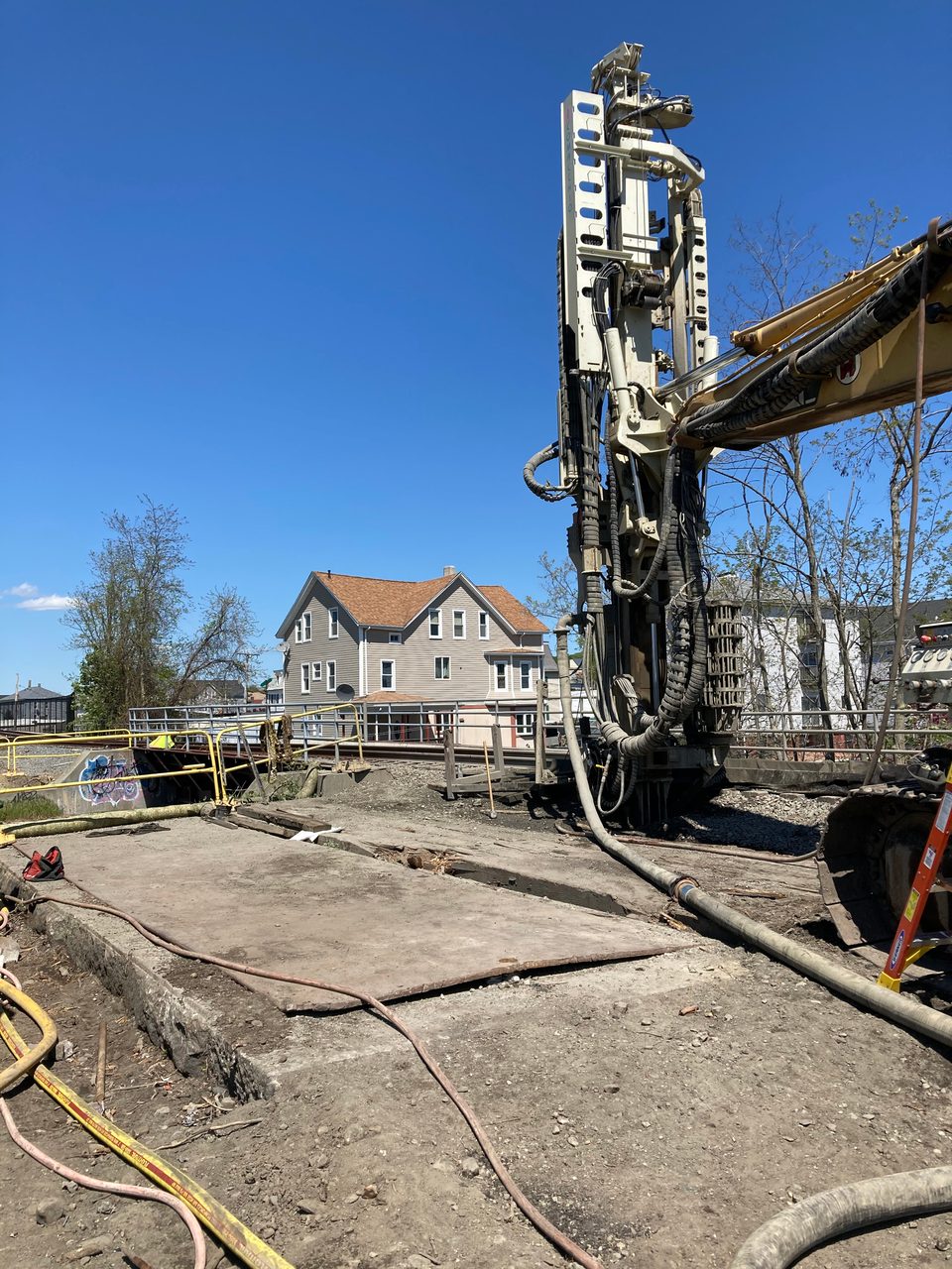 Road surface, Motor vehicle, Sky, Asphalt, Building, Electricity