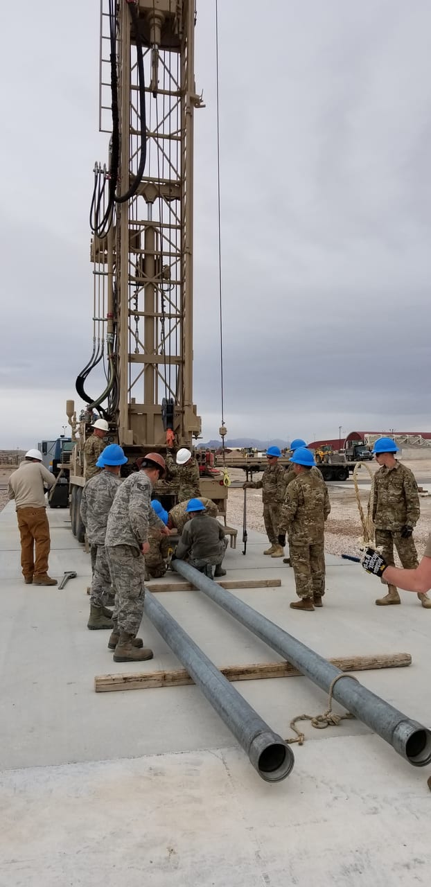 Cargo pants, Military uniform, Footwear, Sky, Trousers, Squad, Vehicle, Cloud, Helmet, Marines