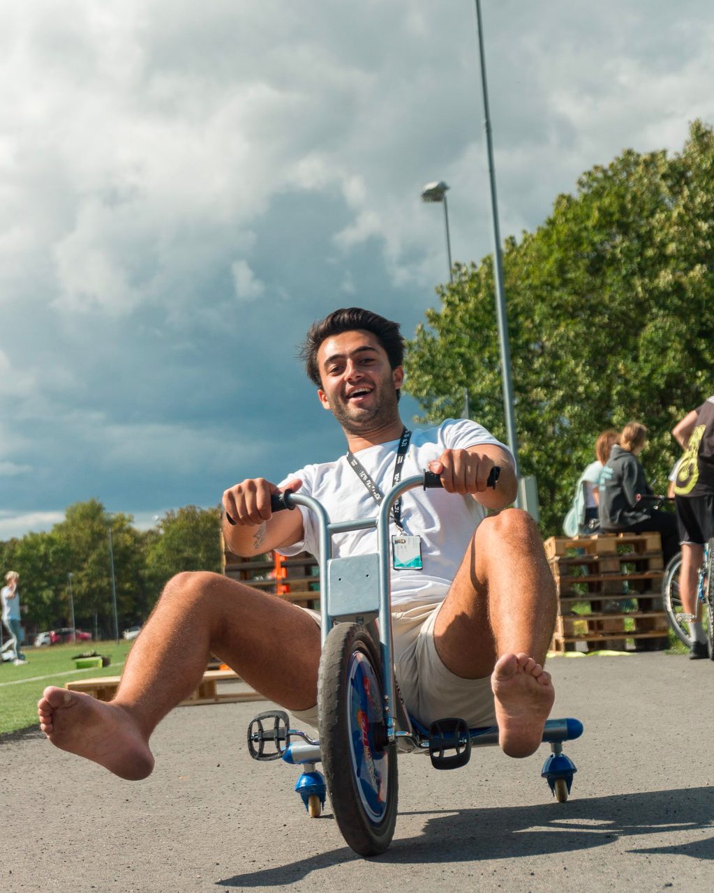 Bicycle wheel, Footwear, Cloud, Sky, Shorts, Shoe, Tire, Tree