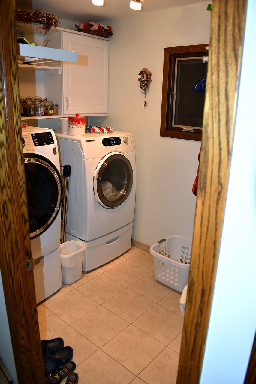 Laundry room, Clothes dryer, Washing machine, Interior design, Home appliance, Curtain, Wood, Floor, Flooring