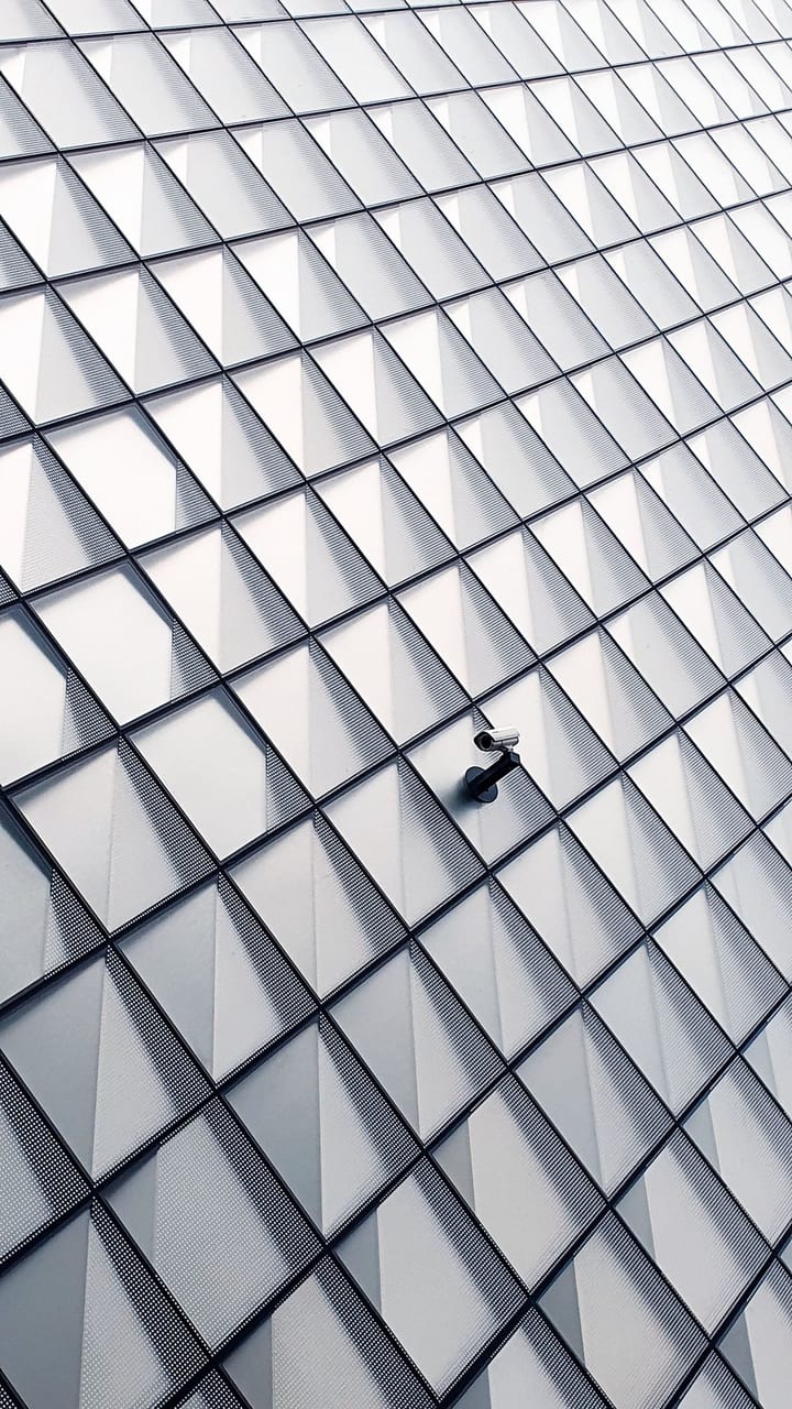 Lone surveillance camera located on the outside of the high tech museum Futurium in Berlin. 