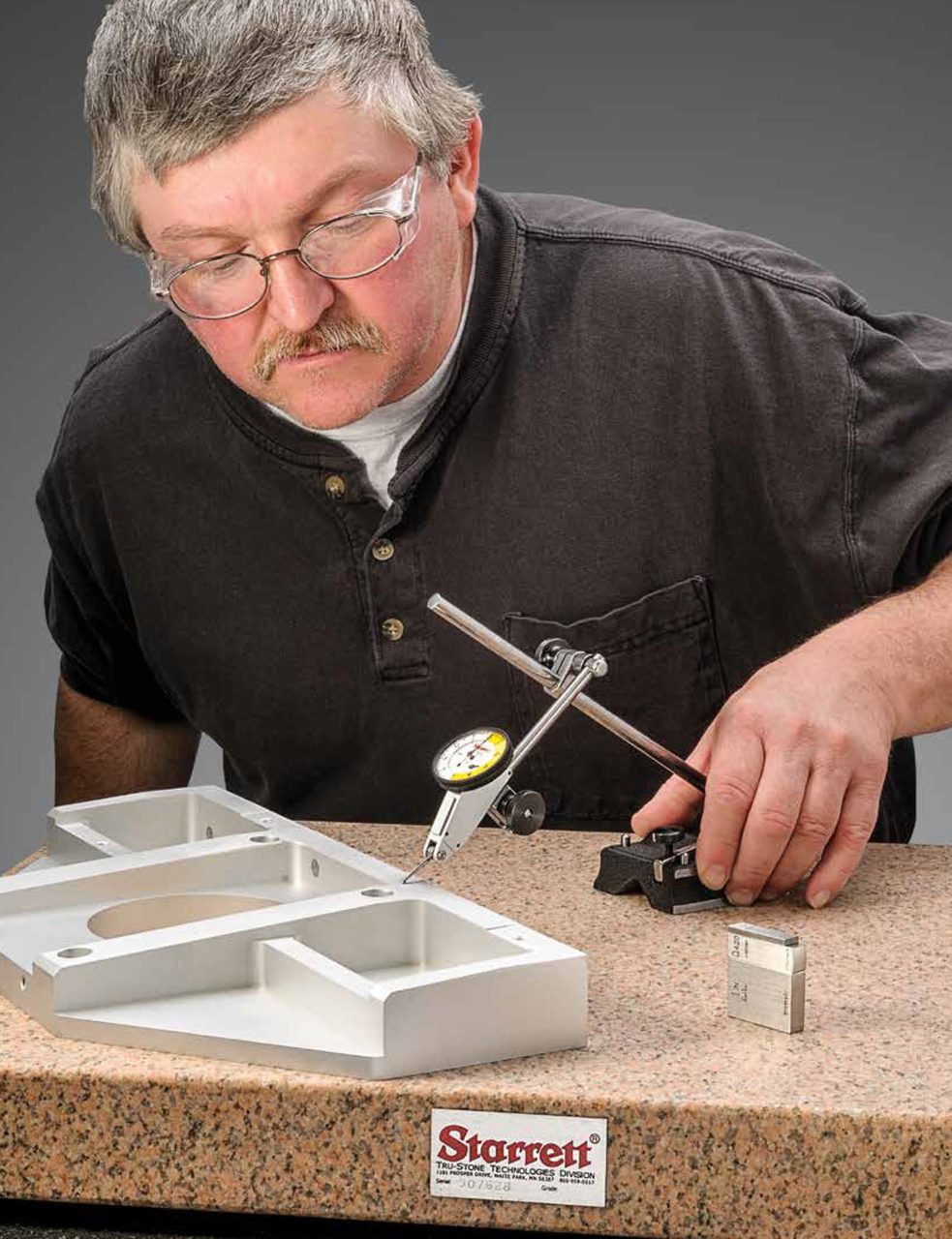 Test indicators are a versatile offering a swivel head feature to allow positioning to suit your line of sight from horizontal to vertical and at any angle up to 90. To ensure surface accuracy, measurements are taken on a Starrett Crystal Pink Granite Surface Plate.