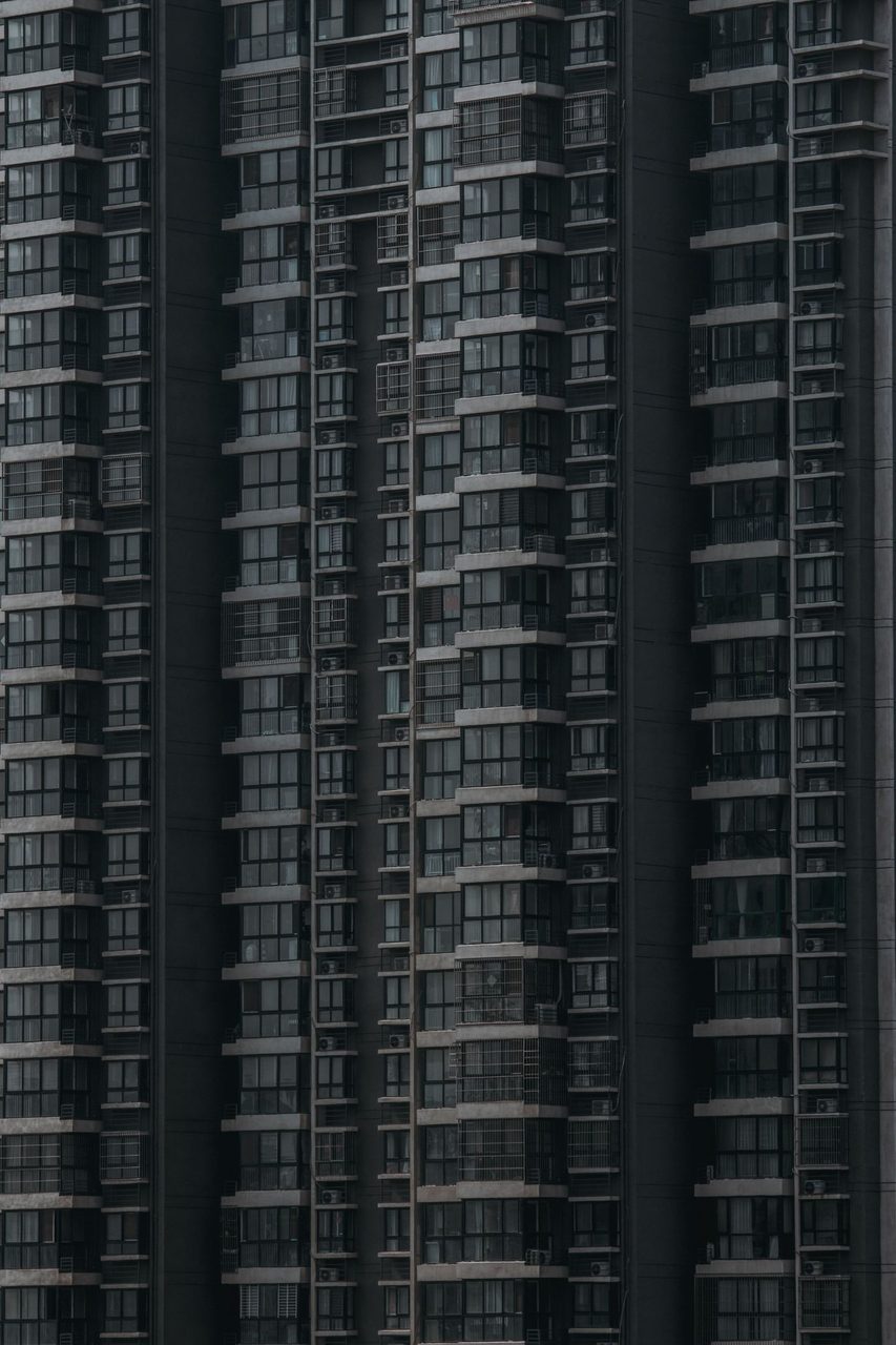 Automotive tire, Tower block, Urban design, Composite material, Building, Window, Architecture, Skyscraper, Grey