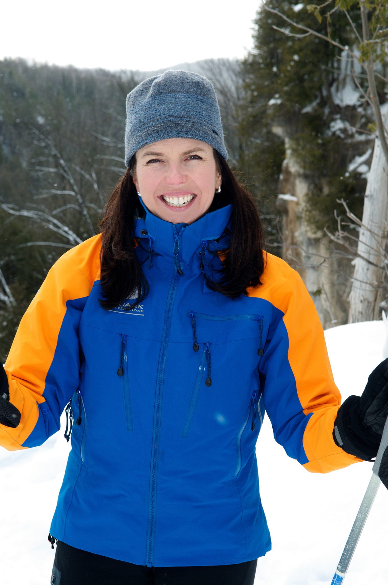 Human body, Outdoor recreation, Smile, Snow, Glove, Tree, Sleeve, Gesture, Freezing, Jacket