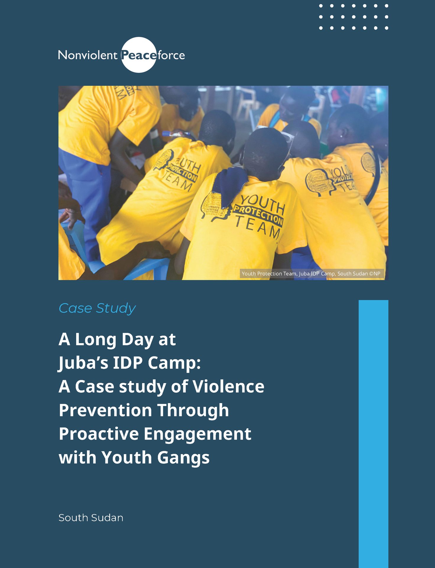Youth Protection Team members in yellow shirts gathered in Juba IDP Camp, South Sudan.