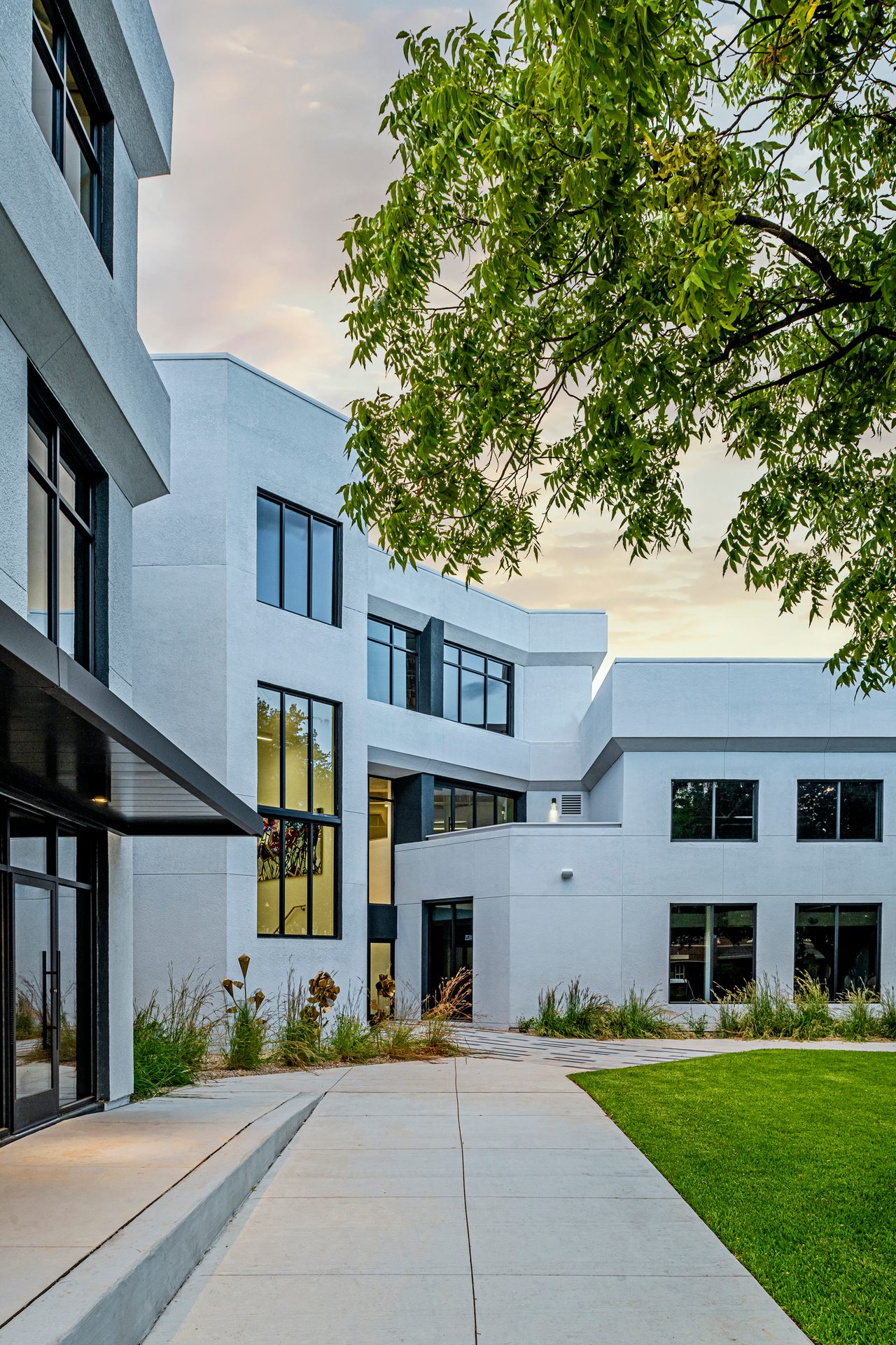 Land lot, Urban design, Plant, Building, Window, Sky, Cloud, Fixture, Door, Tree