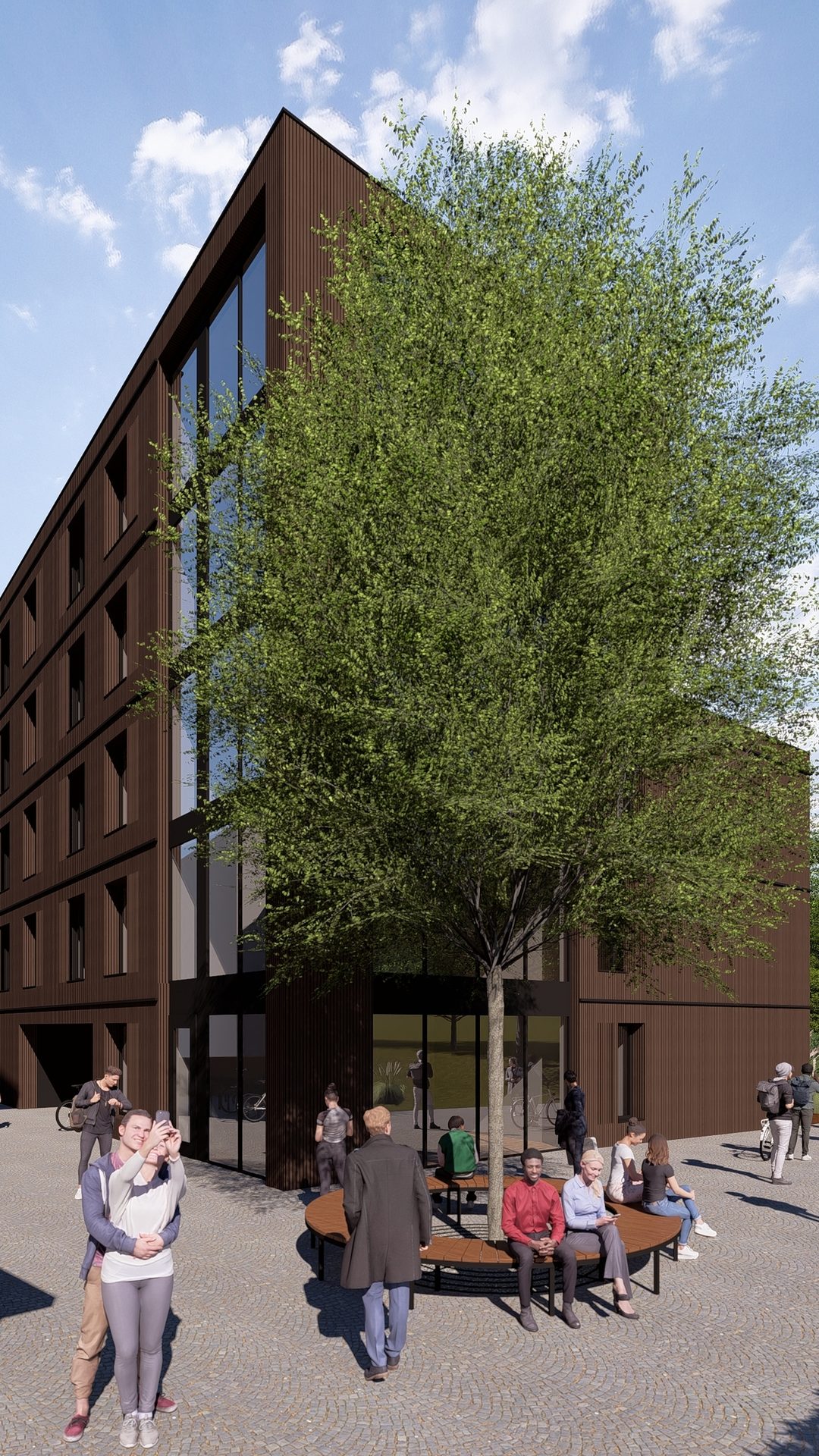 Modern dark building with large windows, a prominent tree, and people on an urban plaza.