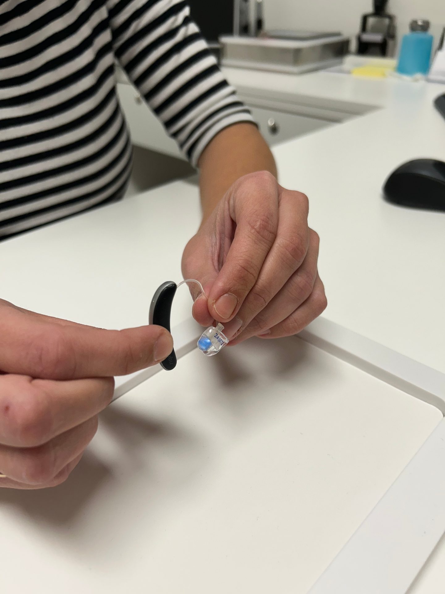 Writing instrument accessory, Office supplies, Hand, Table, Gesture, Nail, Finger, Thumb