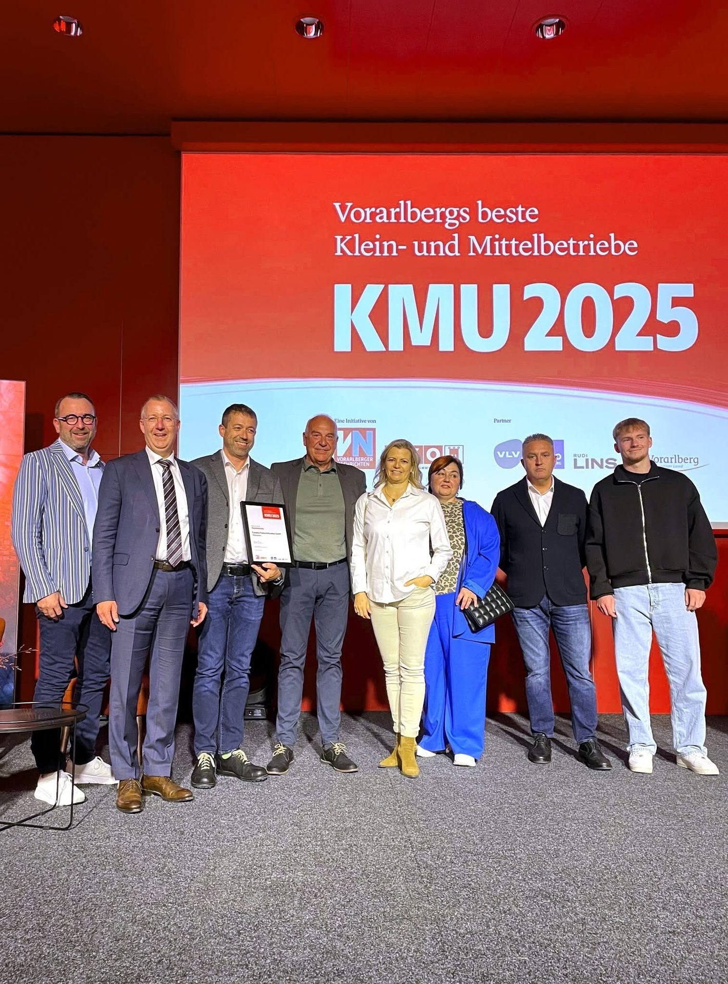 Group of people at the Vorarlberg KMU 2025 event, likely award winners or organizers.