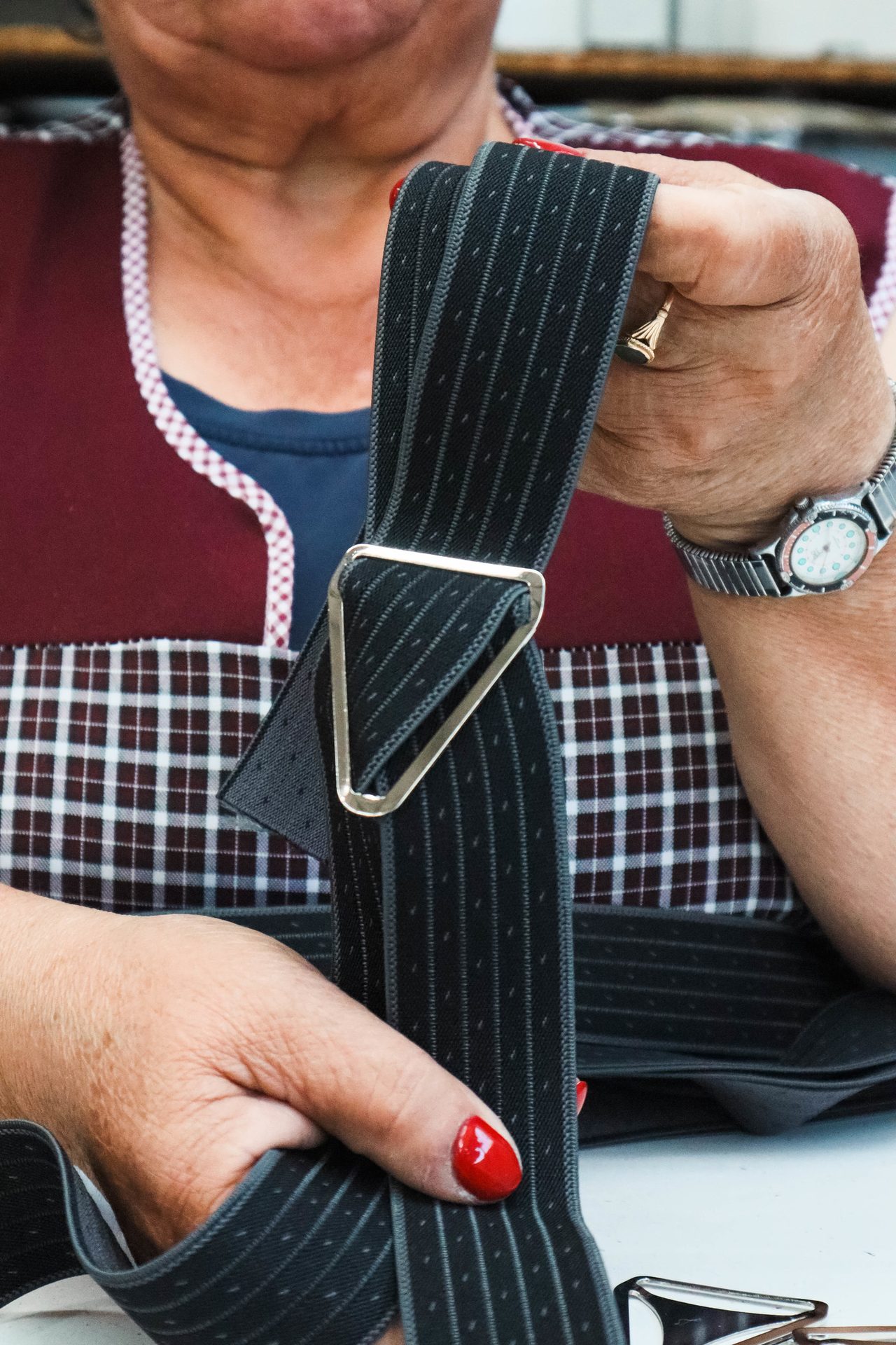 Guitar accessory, Musical instrument, Joint, Watch, Hand, Sunglasses, Fashion, Textile, Sleeve, Tartan