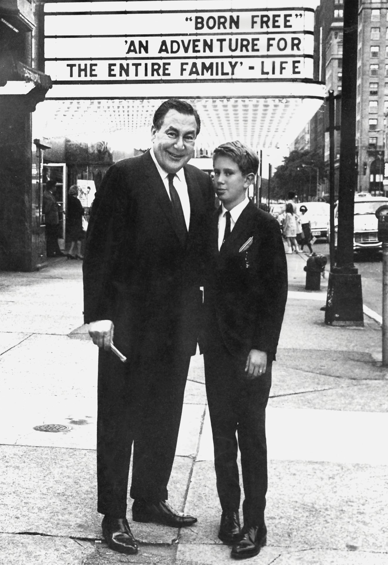 Suit trousers, Smile, Photograph, White, Black, Infrastructure, Human, Coat, Black-and-white, Standing