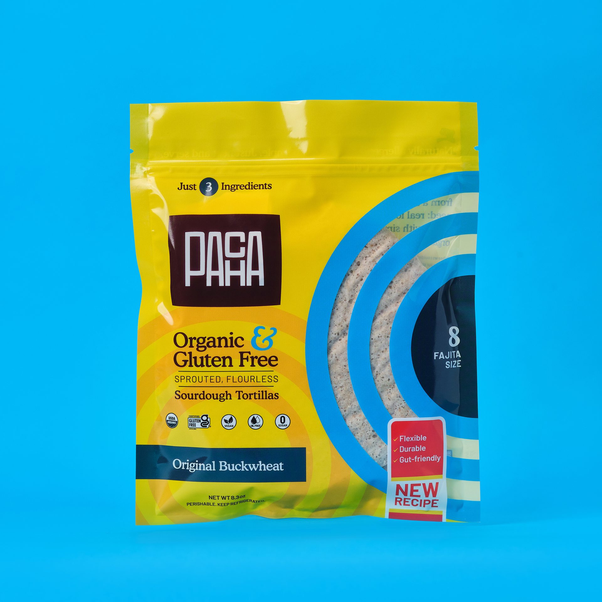 Yellow and blue Pasa Organic & Gluten-Free Sourdough Tortillas package on a blue background.