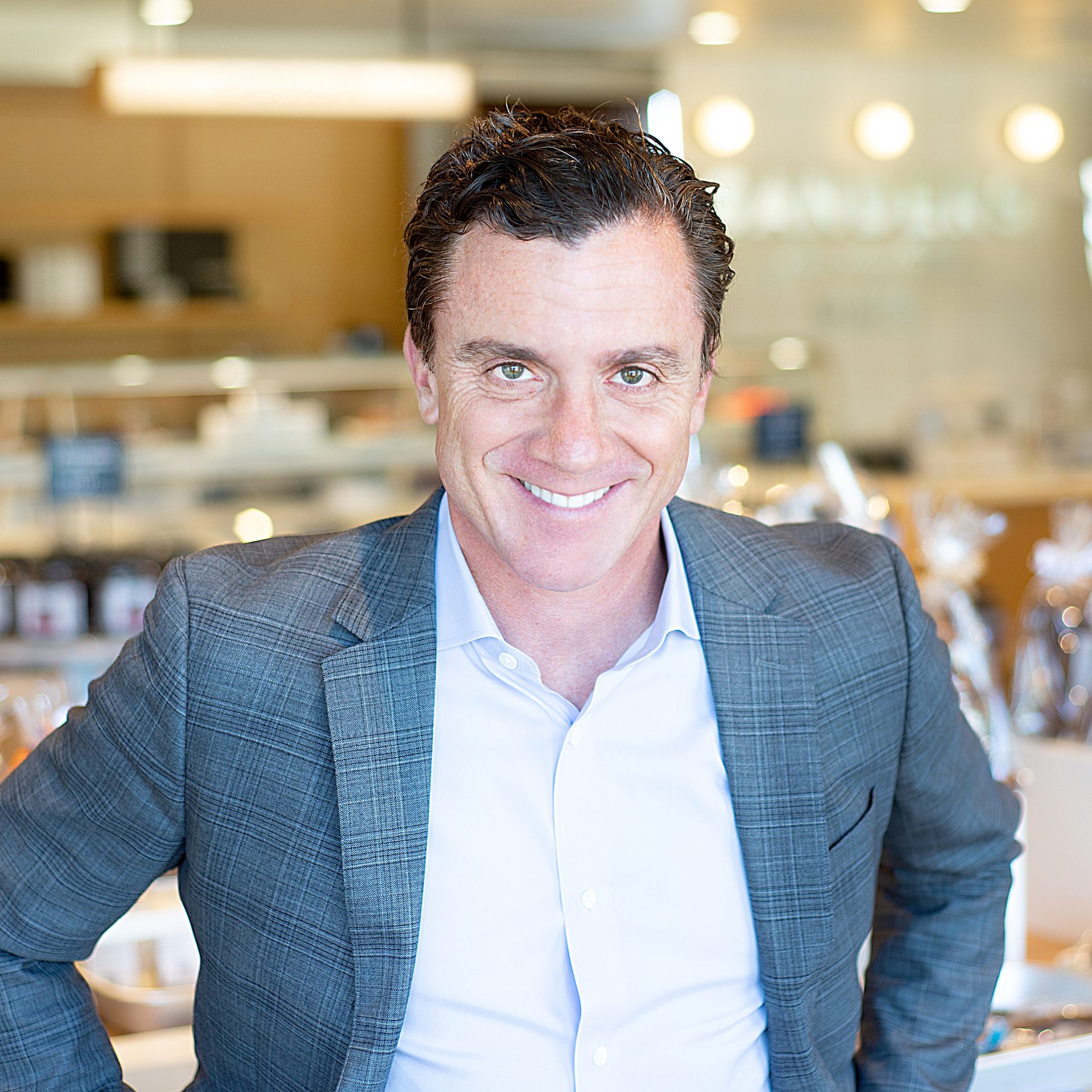 Dress shirt, Smile, Chin, Sleeve, Collar, Retail interior