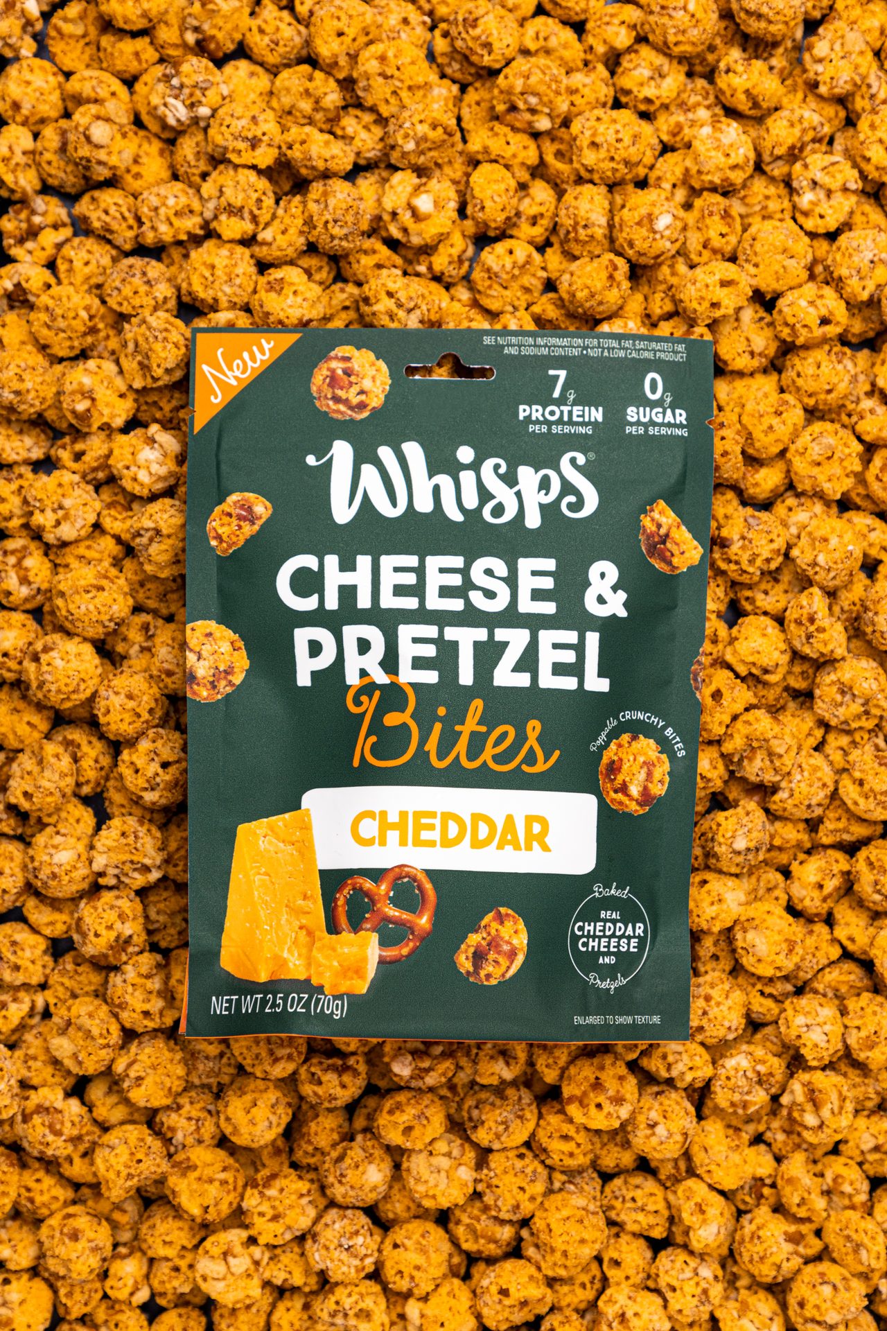 Product bag, Laying on background of crunchy snacks, Cheddar, Pretzel