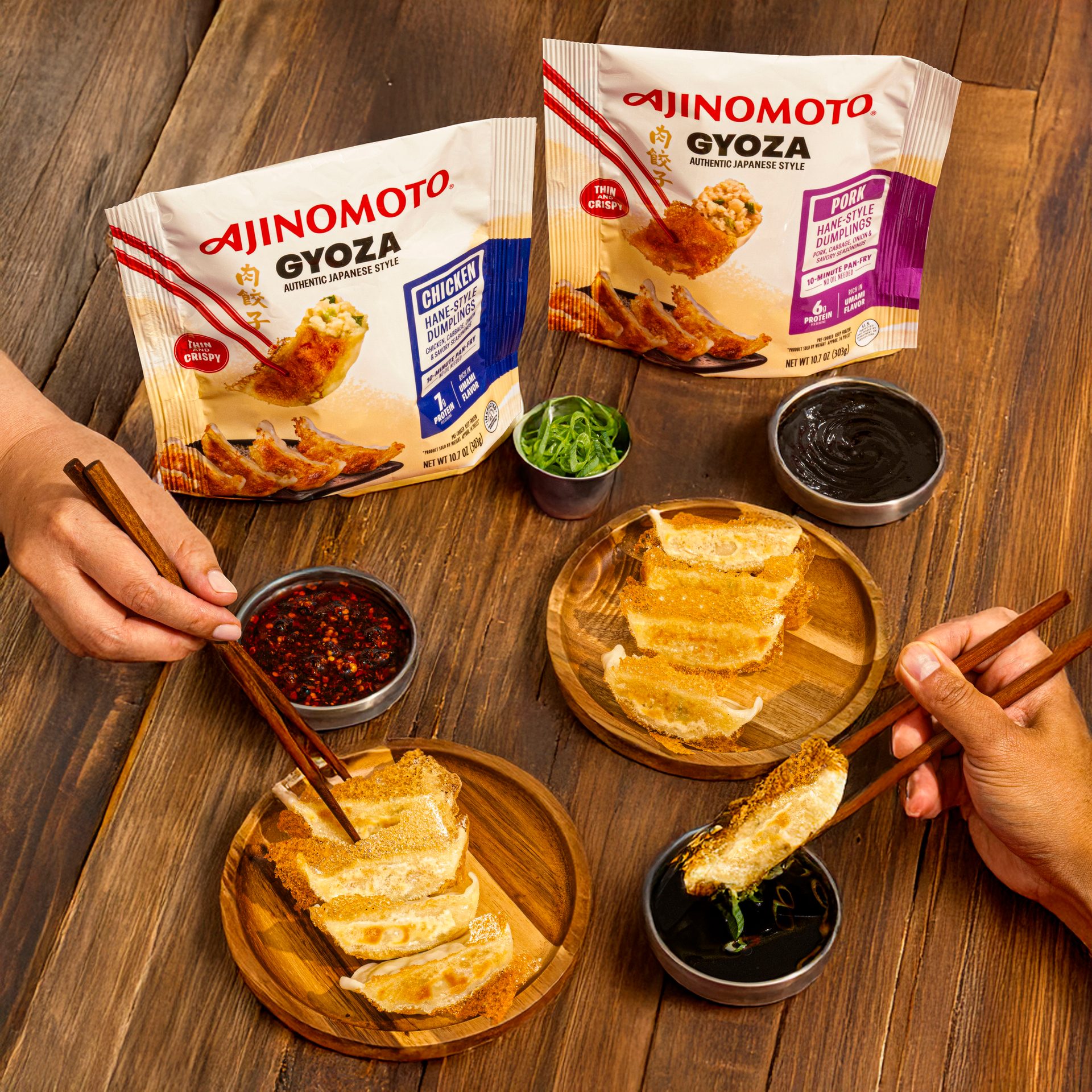 Ajinomoto Gyoza bags, crispy cooked gyoza, various dipping sauces, and hands using chopsticks.