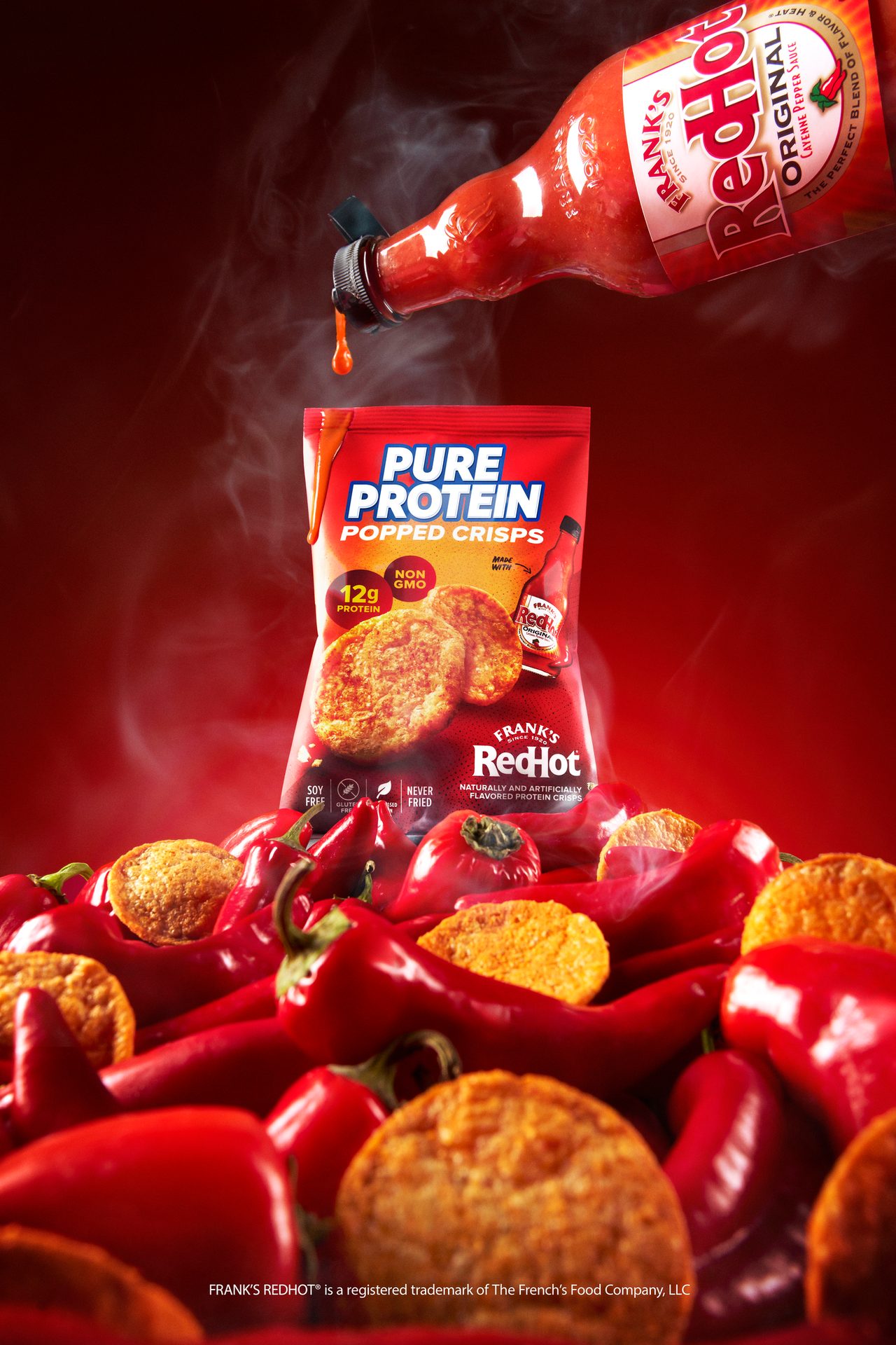 Frank's RedHot sauce pouring onto Pure Protein crisps bag with red peppers.