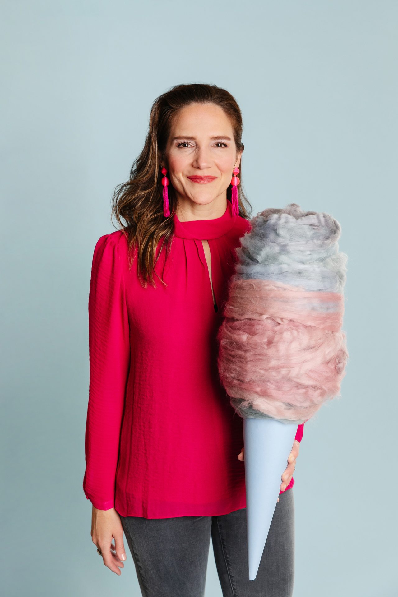 Cotton candy, Smile, Food, Sleeve, Gesture, Pink, Cone