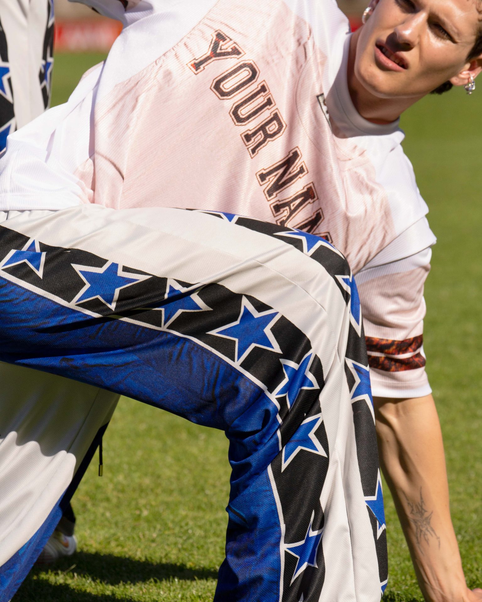 Sports uniform, White, Blue, Sleeve, Hat, Gesture, Player