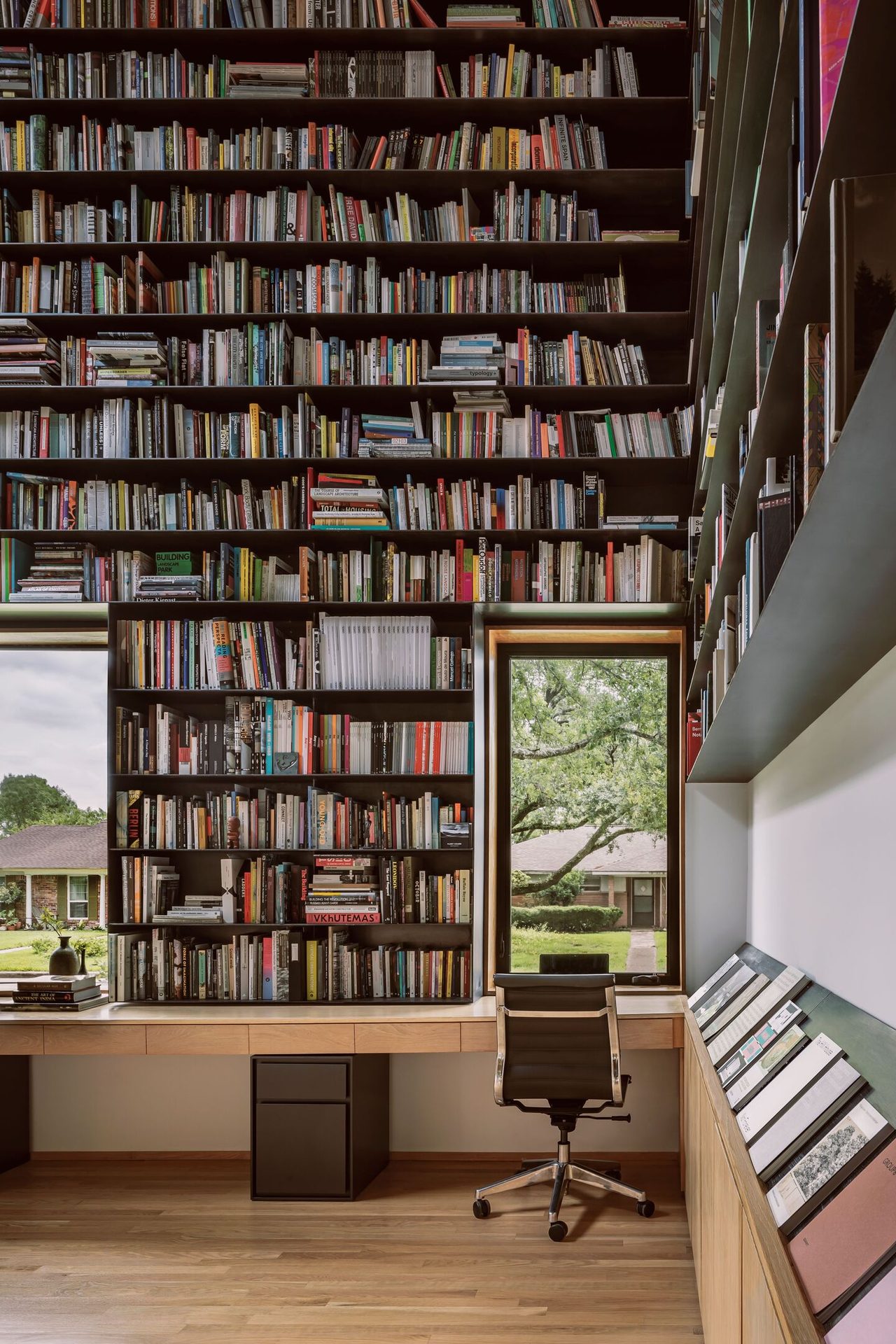 Interior design, Bookcase, Property, Furniture, Shelf, Book, Shelving, Publication, Wood, Lighting