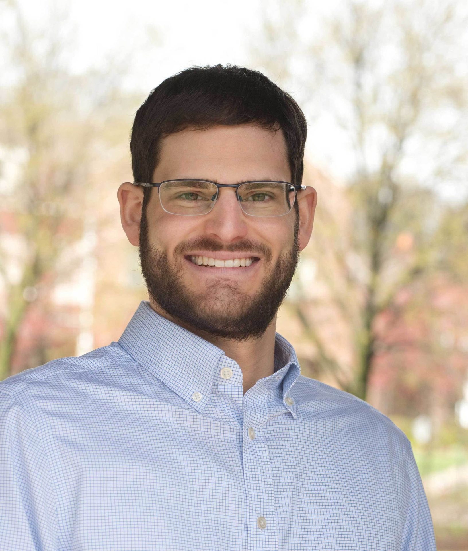 Vision care, Dress shirt, Forehead, Glasses, Smile, Eyebrow, Beard, Sleeve, Happy, Gesture