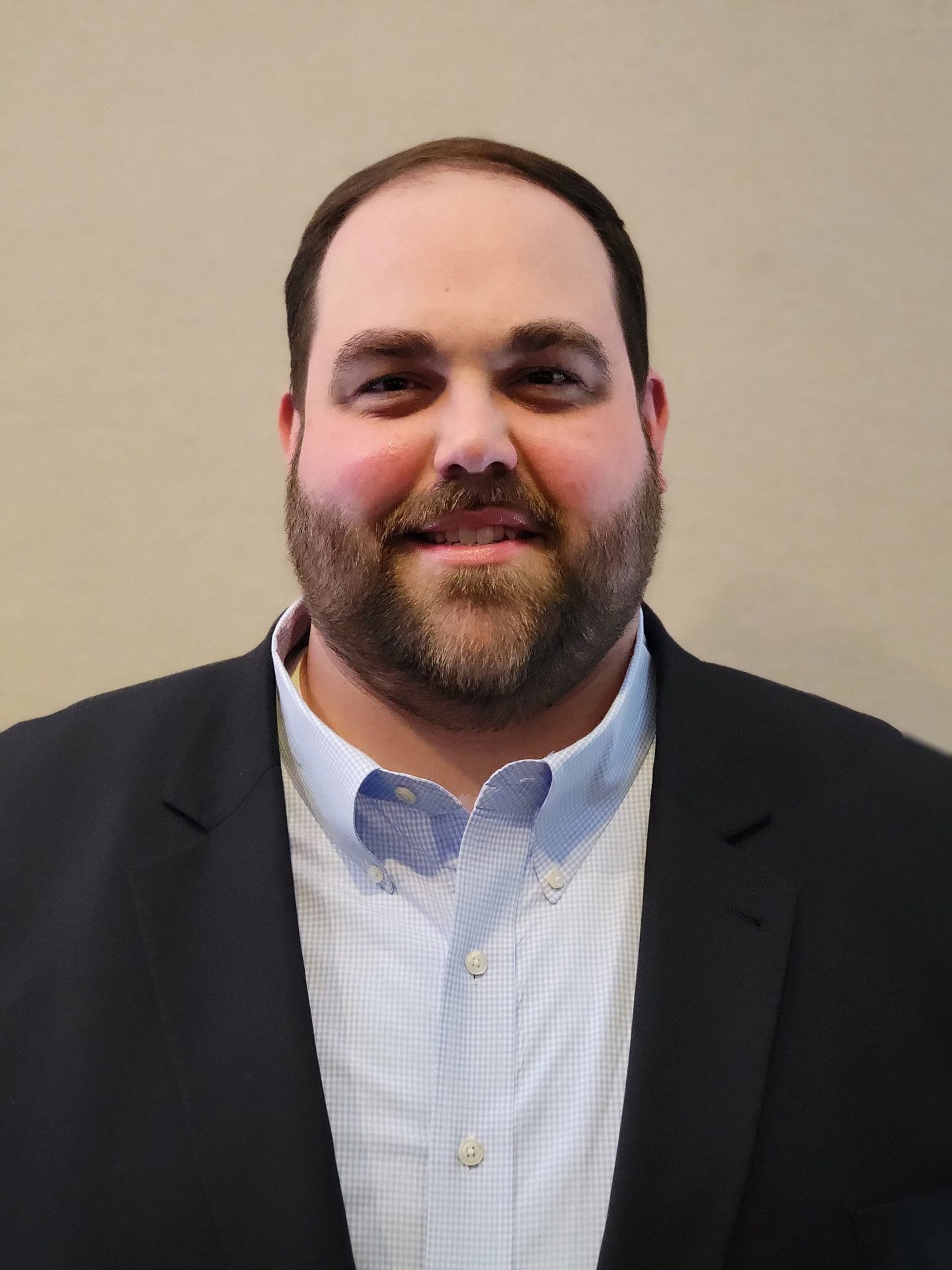Facial expression, Dress shirt, Forehead, Cheek, Chin, Hairstyle, Eyebrow, Smile, Beard