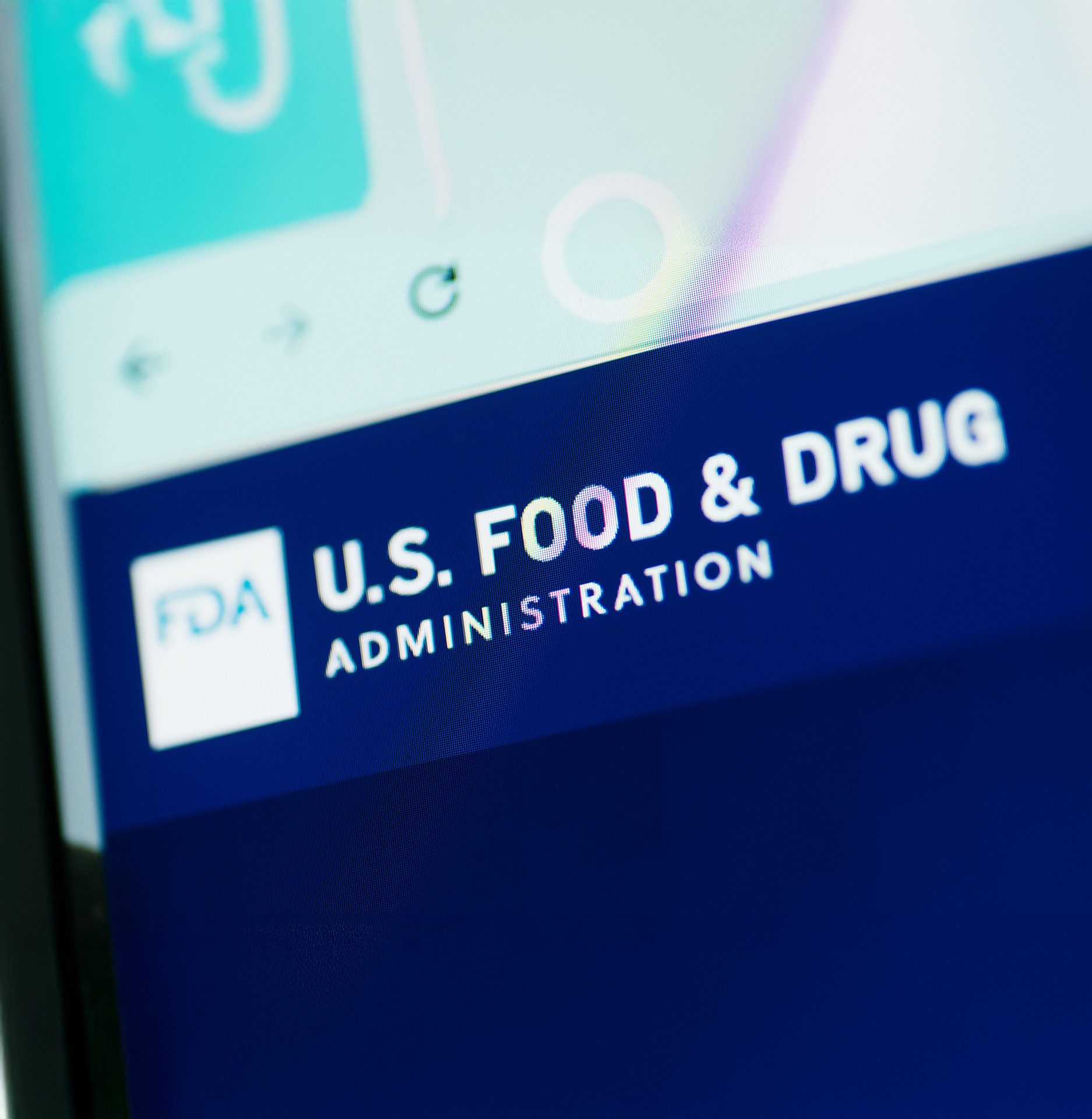 FDA logo and "U.S. Food & Drug Administration" text on a screen.