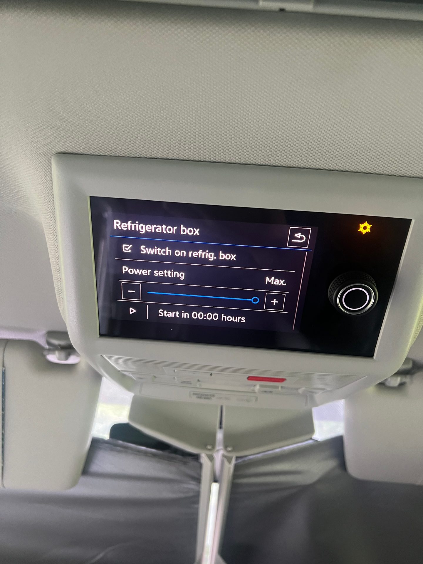 Vehicle overhead display showing refrigerator box controls: switch on, power setting, and timer.