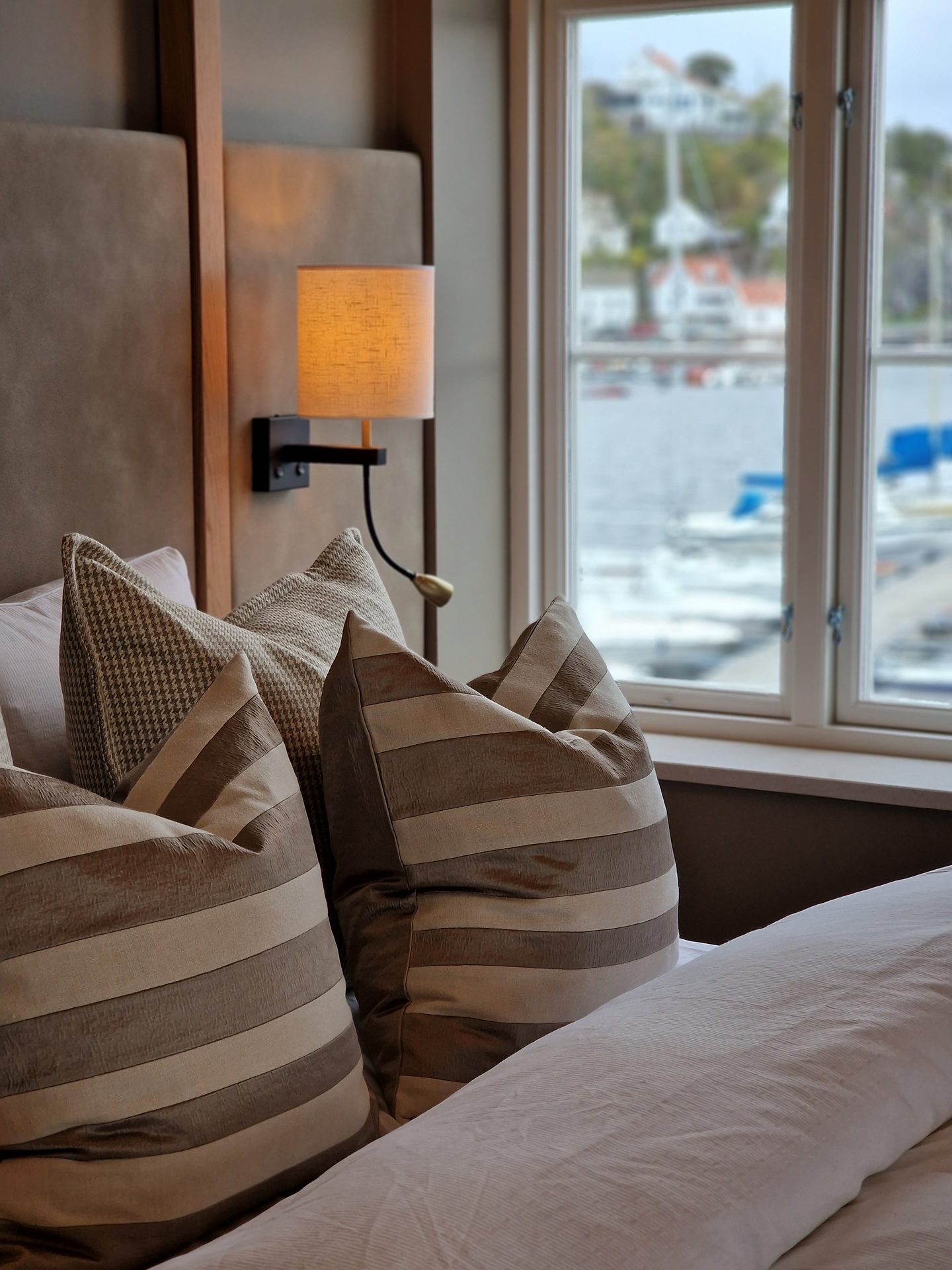 Interior design, Living room, Property, Furniture, Couch, Comfort, Window, Wood, Textile, Lamp