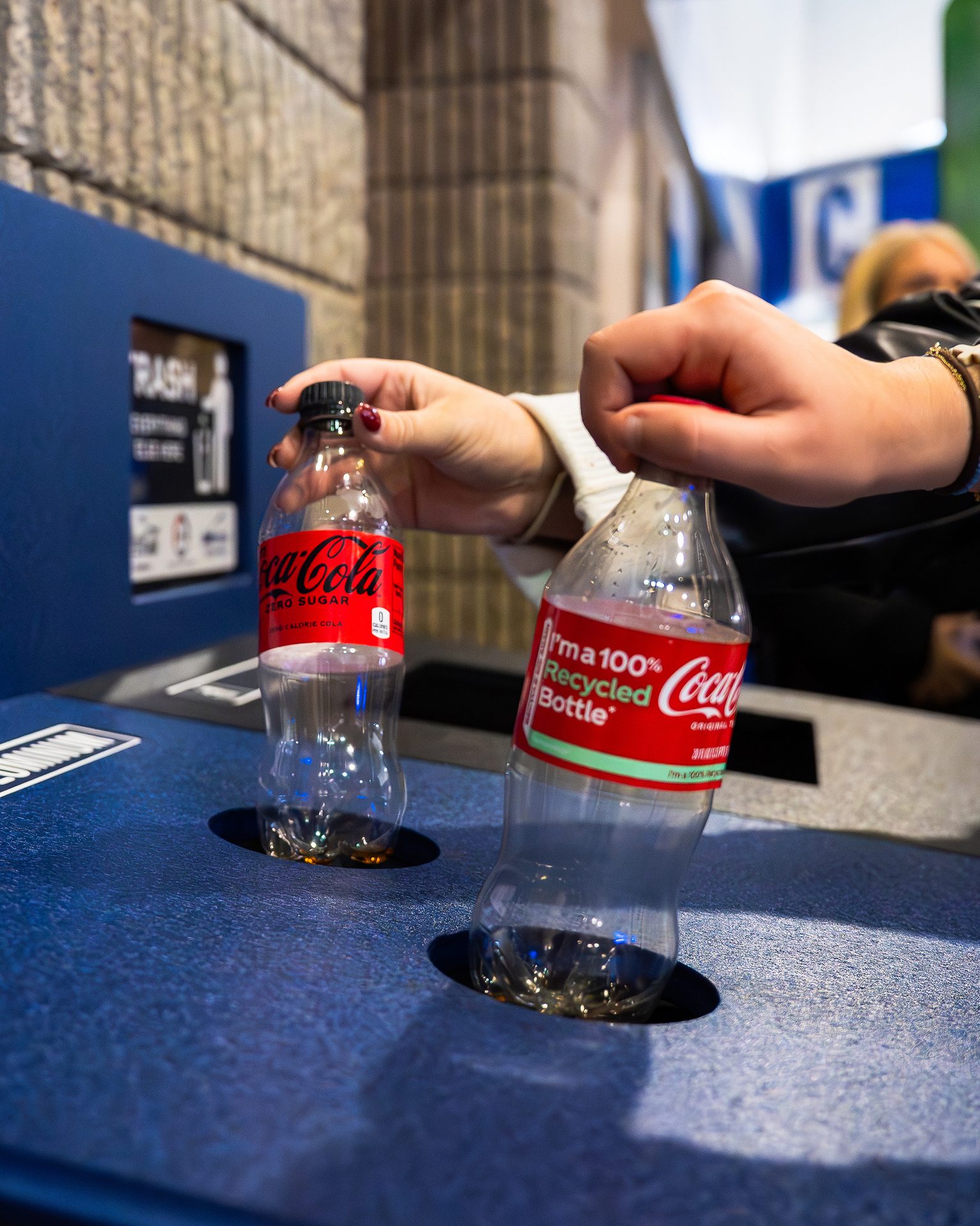 Carbonated soft drinks, Plastic bottle, Cola, Liquid, Logo, Drinkware, Coca-Cola