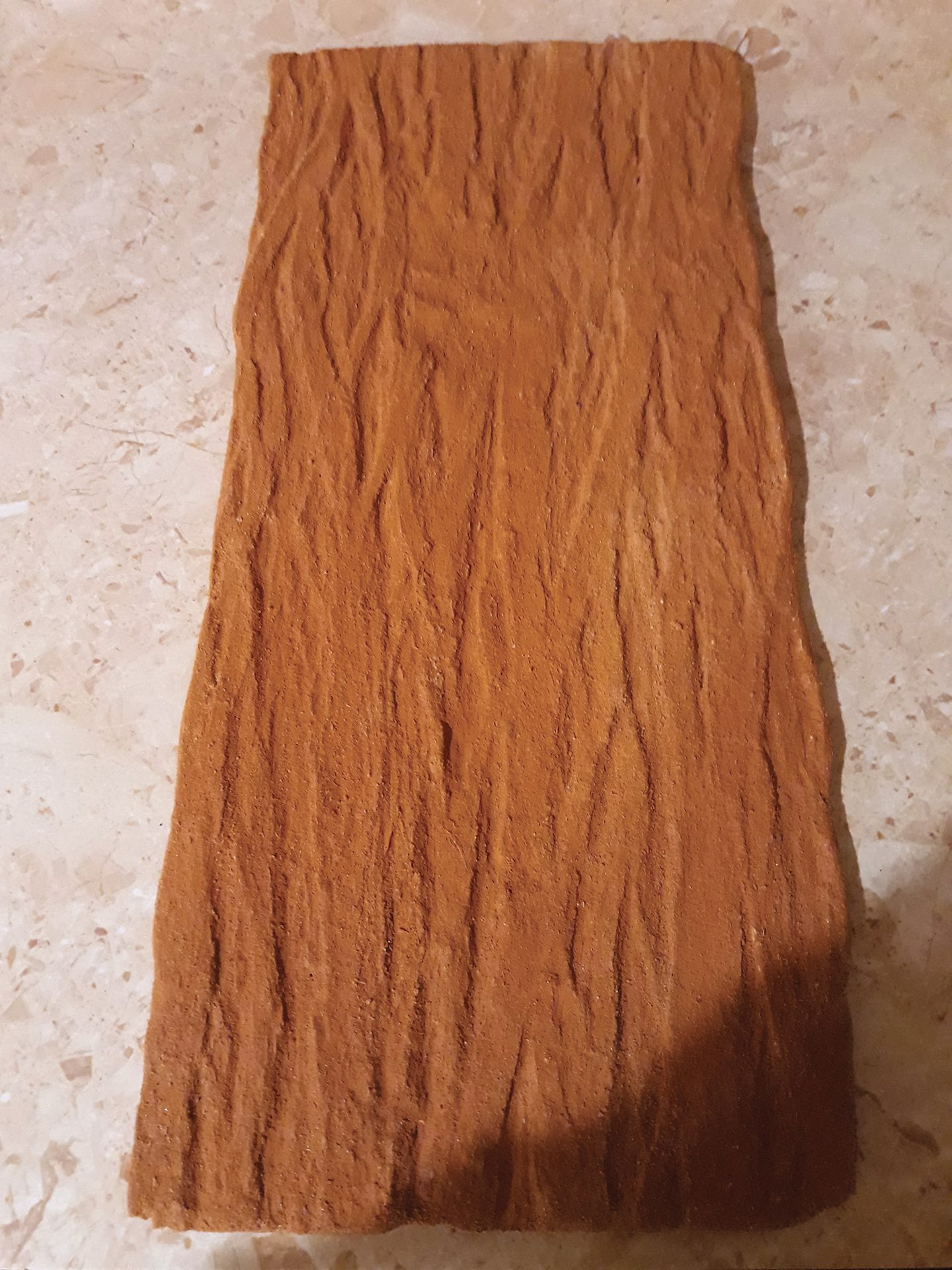 Neuskyns slab embossed with redwood bark pattern