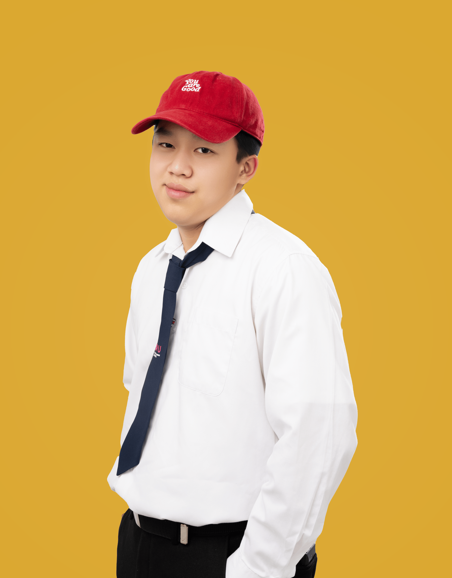 Dress shirt, Human body, School uniform, Cricket cap, Tie, Neck, Sleeve, Gesture