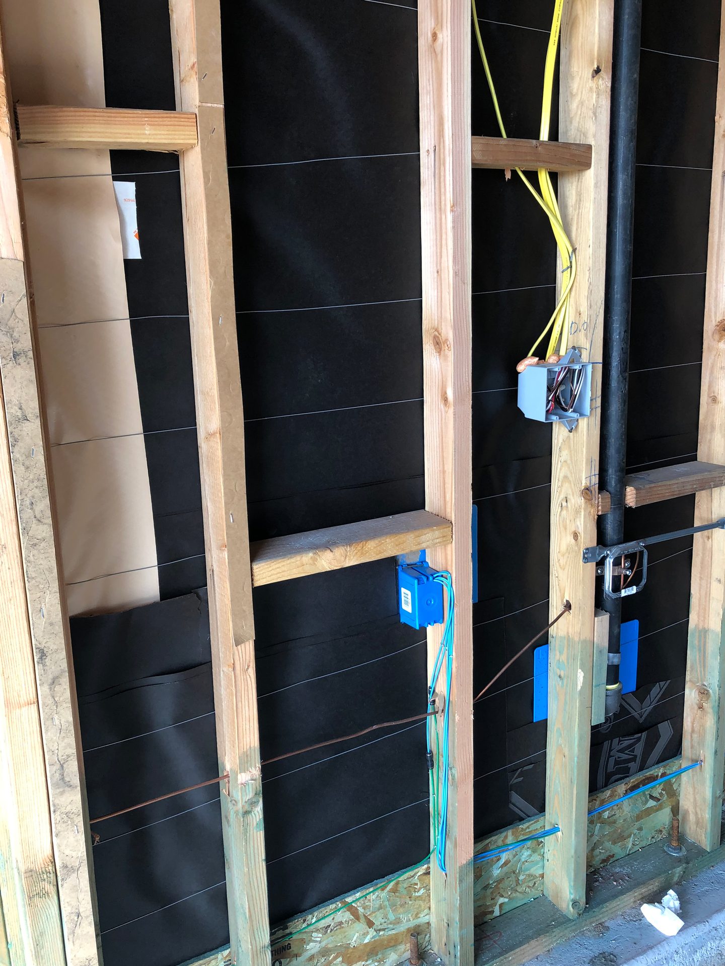 Wooden 2x4 studs in wall