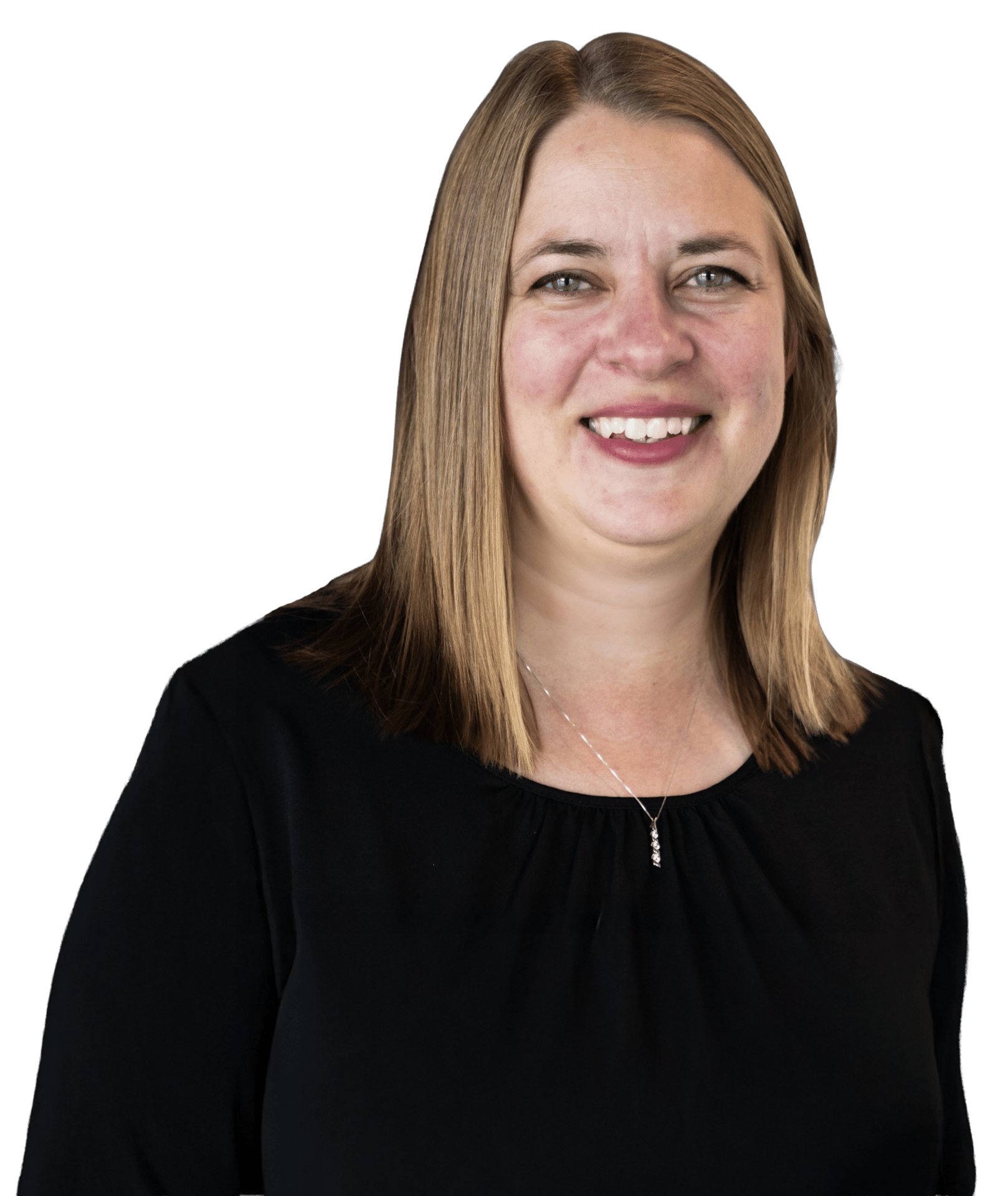 Smiling woman with blonde hair, black top, and silver pendant necklace on a green background.