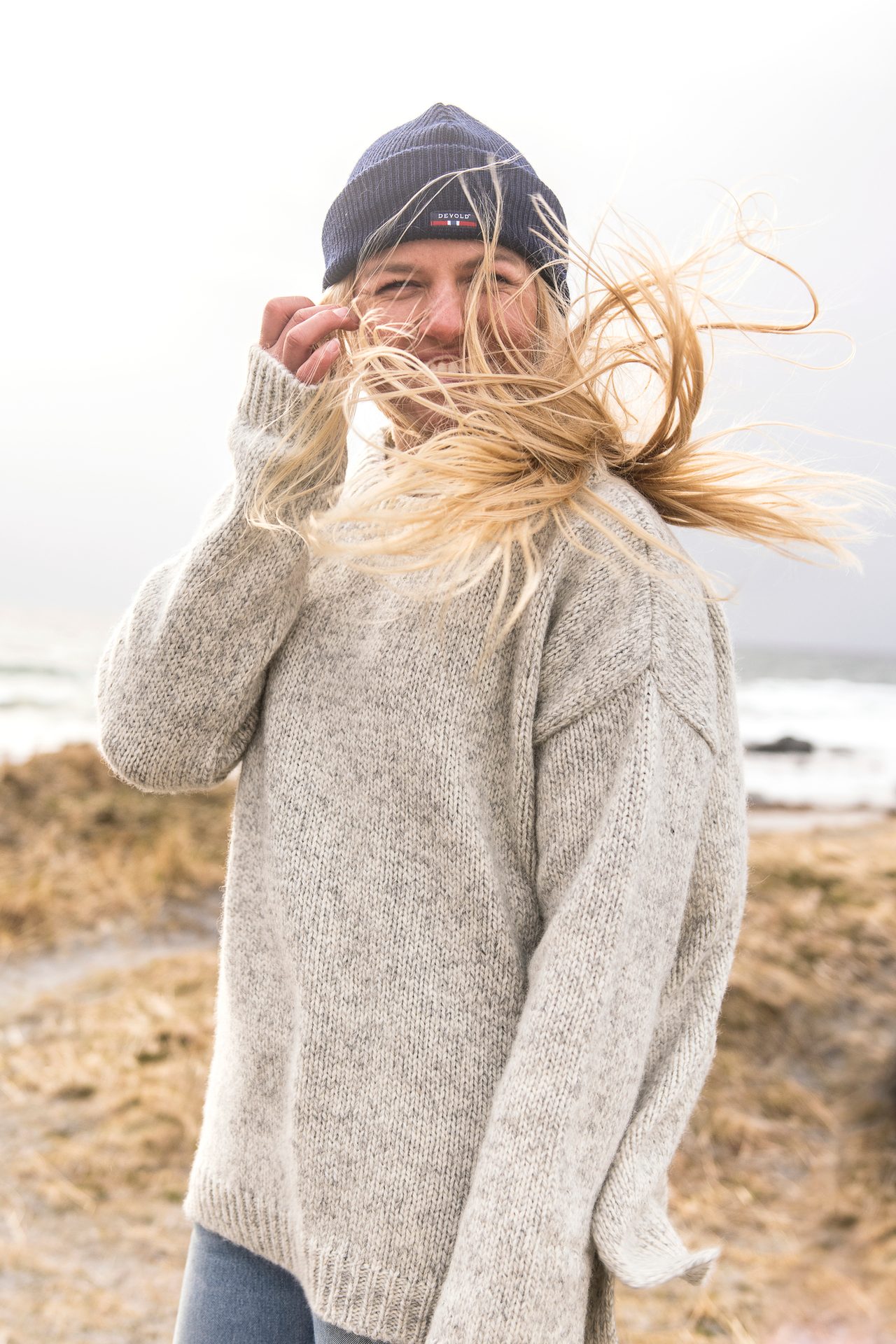 Flash photography, Clothing, Sky, Outerwear, Water, Beard, Sleeve, Standing, Happy, Eyewear