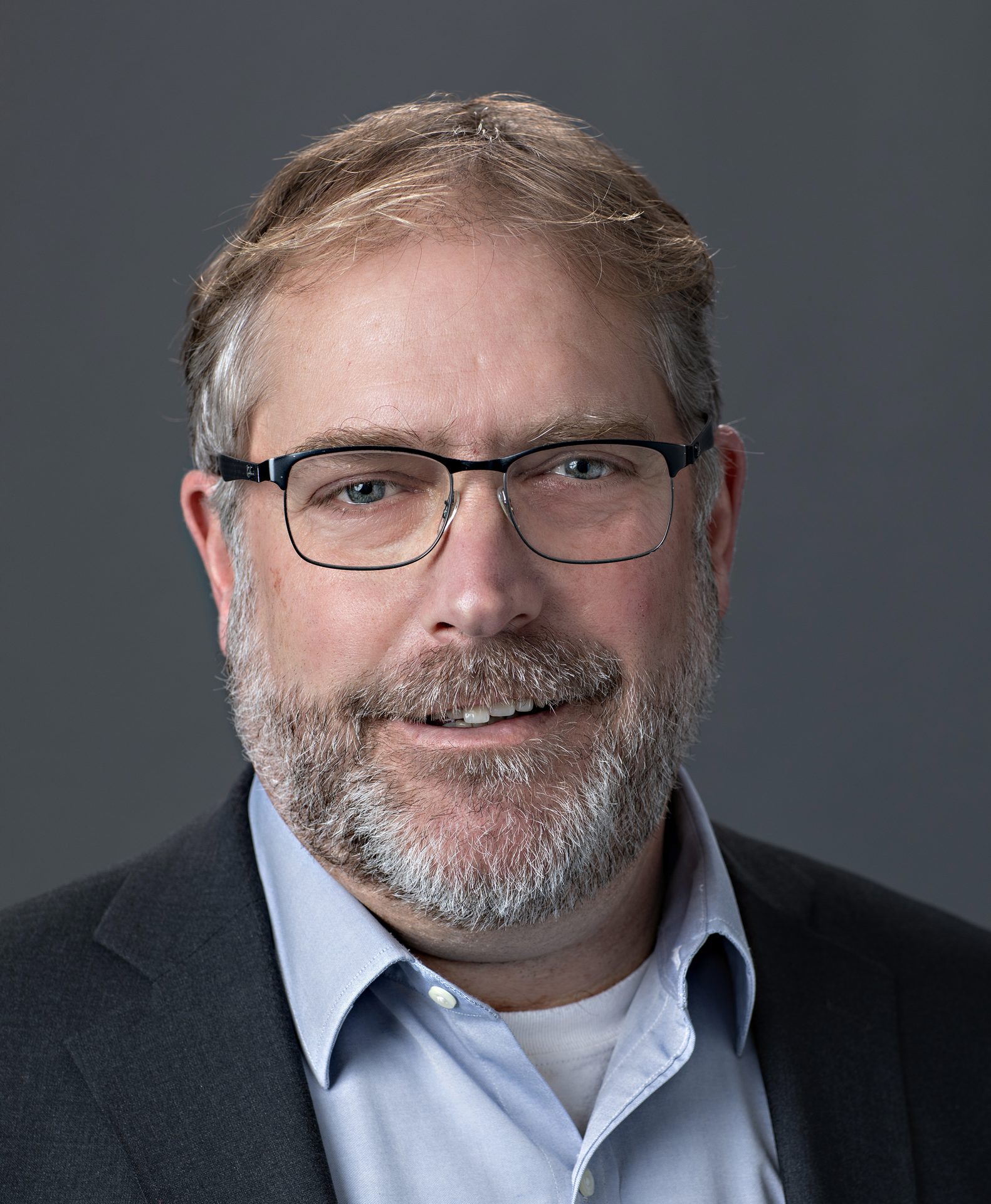 Vision care, Dress shirt, Clothing, Forehead, Smile, Glasses, Chin, Beard, Jaw, Collar