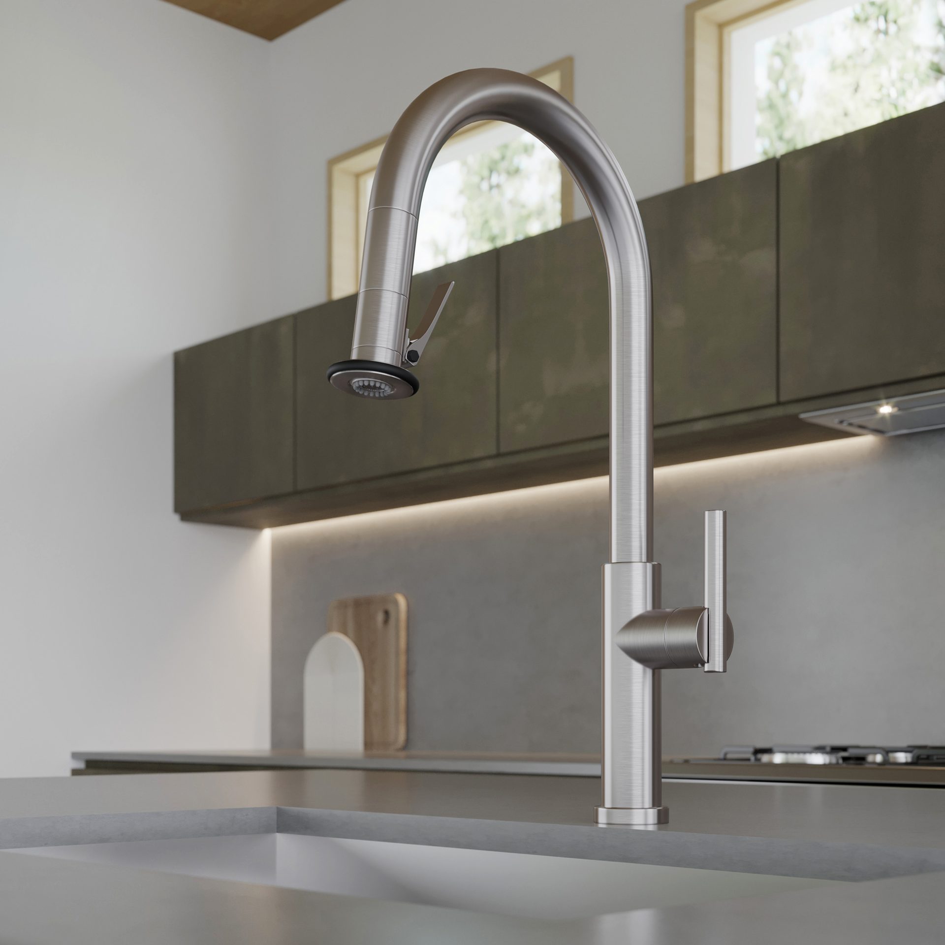 Brushed stainless steel pull-down kitchen faucet in a modern kitchen.