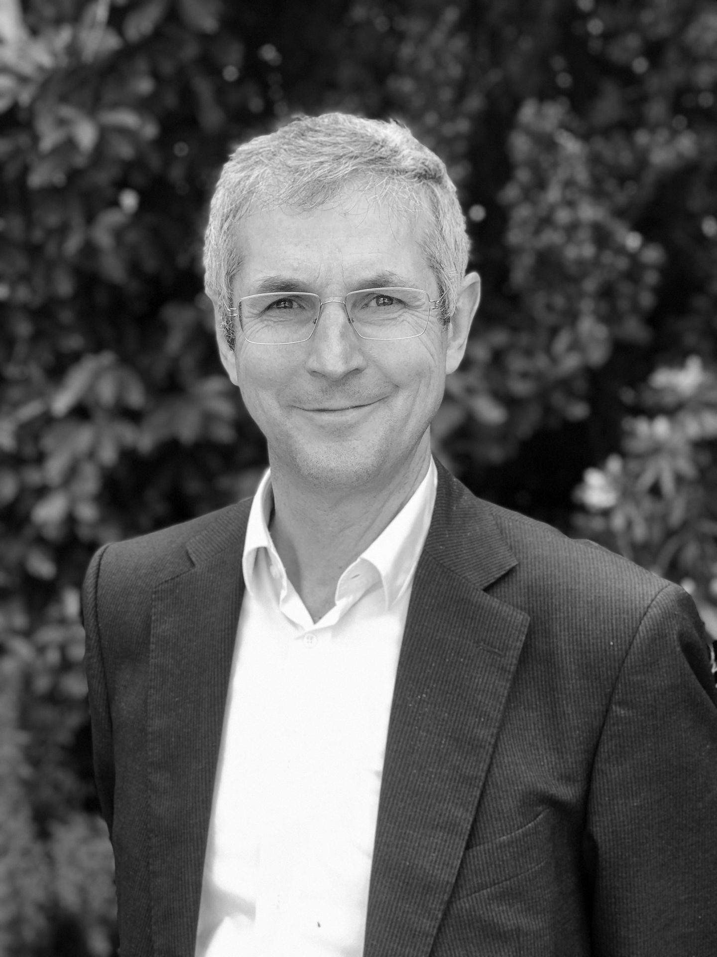 Smile, Coat, Plant, Sleeve, Style, Black-and-white, Suit, Collar