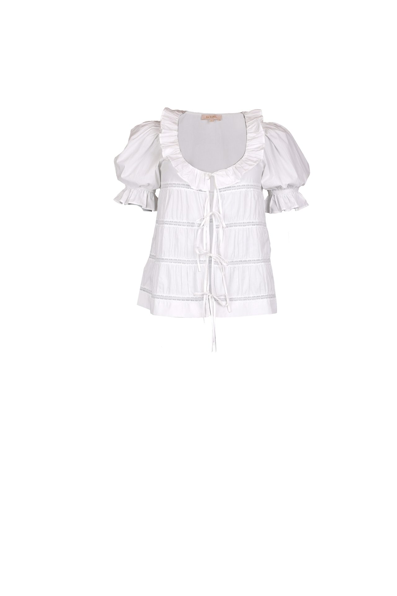 White tiered blouse with ruffled neckline, puff sleeves, and front ties.