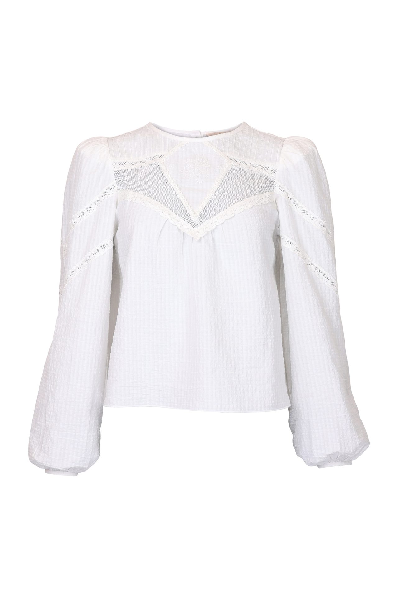 White textured blouse with lace and mesh yoke and puff sleeves.
