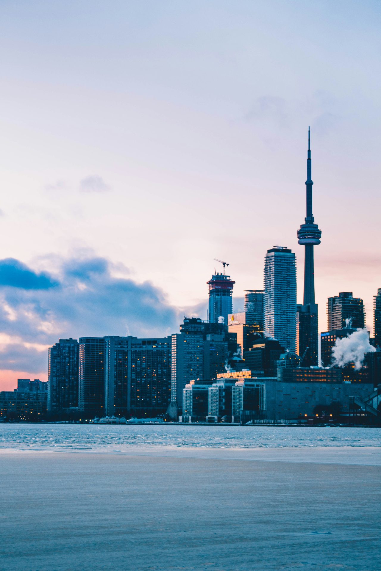 Body of water, Tower block, Cloud, Sky, Building, Skyscraper, Atmosphere, World