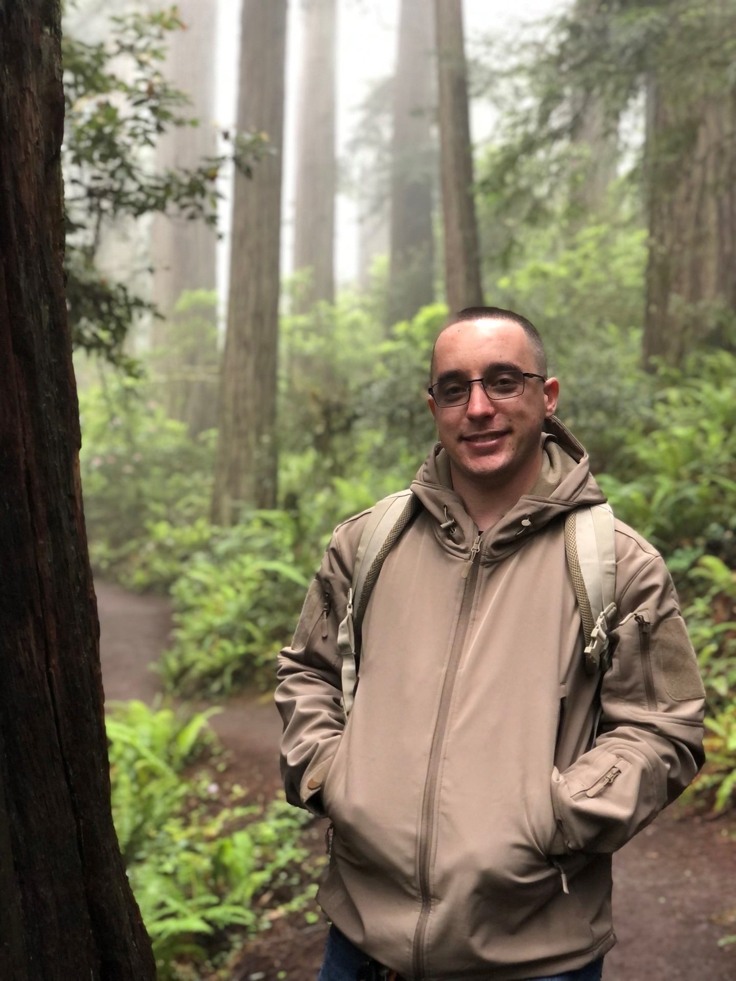 People in nature, Natural environment, Terrestrial plant, Jeans, Smile, Tree, Wood, Biome
