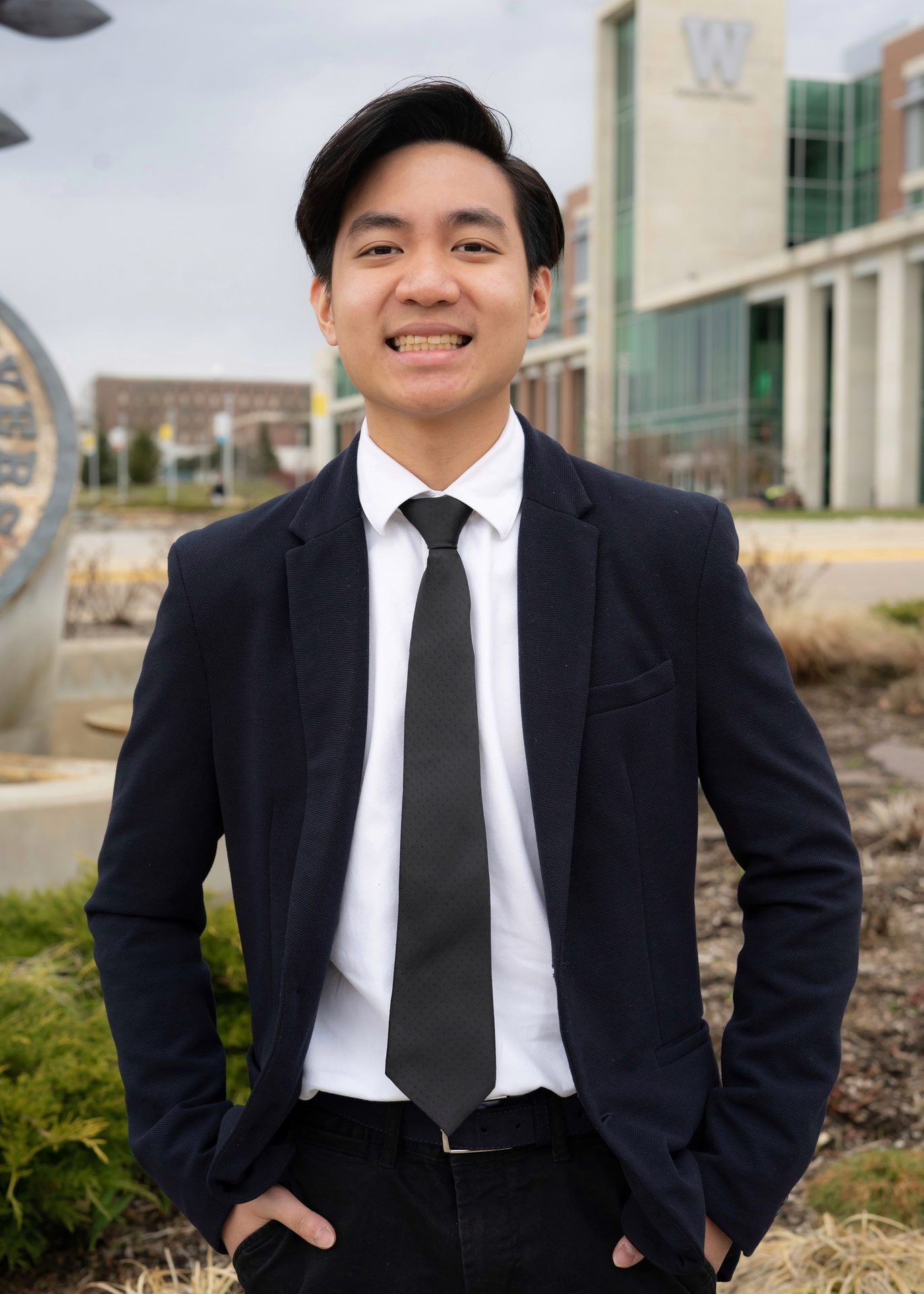 Dress shirt, School uniform, Flash photography, Outerwear, Hairstyle, Smile, Tie, Plant, Neck, Sleeve