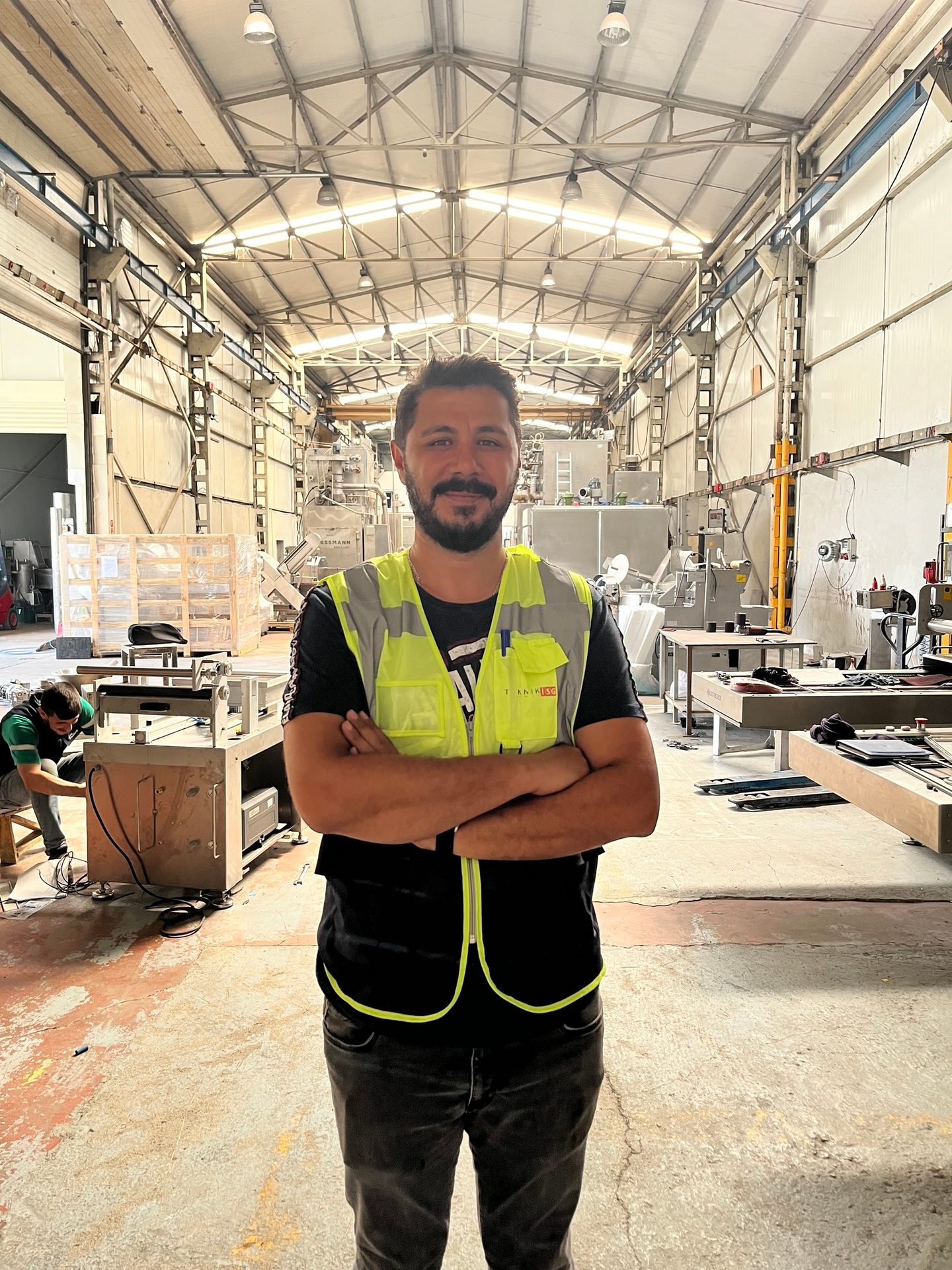 High-visibility clothing, Motor vehicle, Automotive design, Workwear, Sleeve, Smile, Tradesman, Engineer