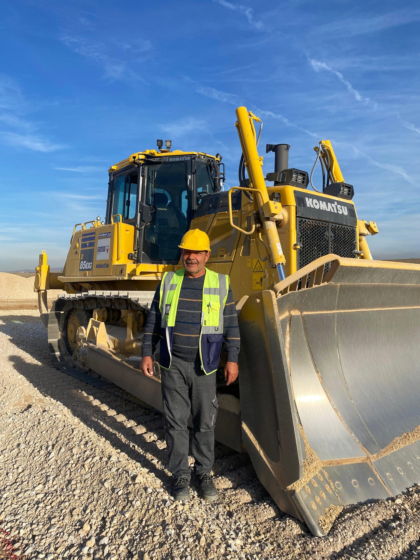 Automotive tire, Road surface, Cloud, Sky, Vehicle, Wheel, Asphalt, Rolling