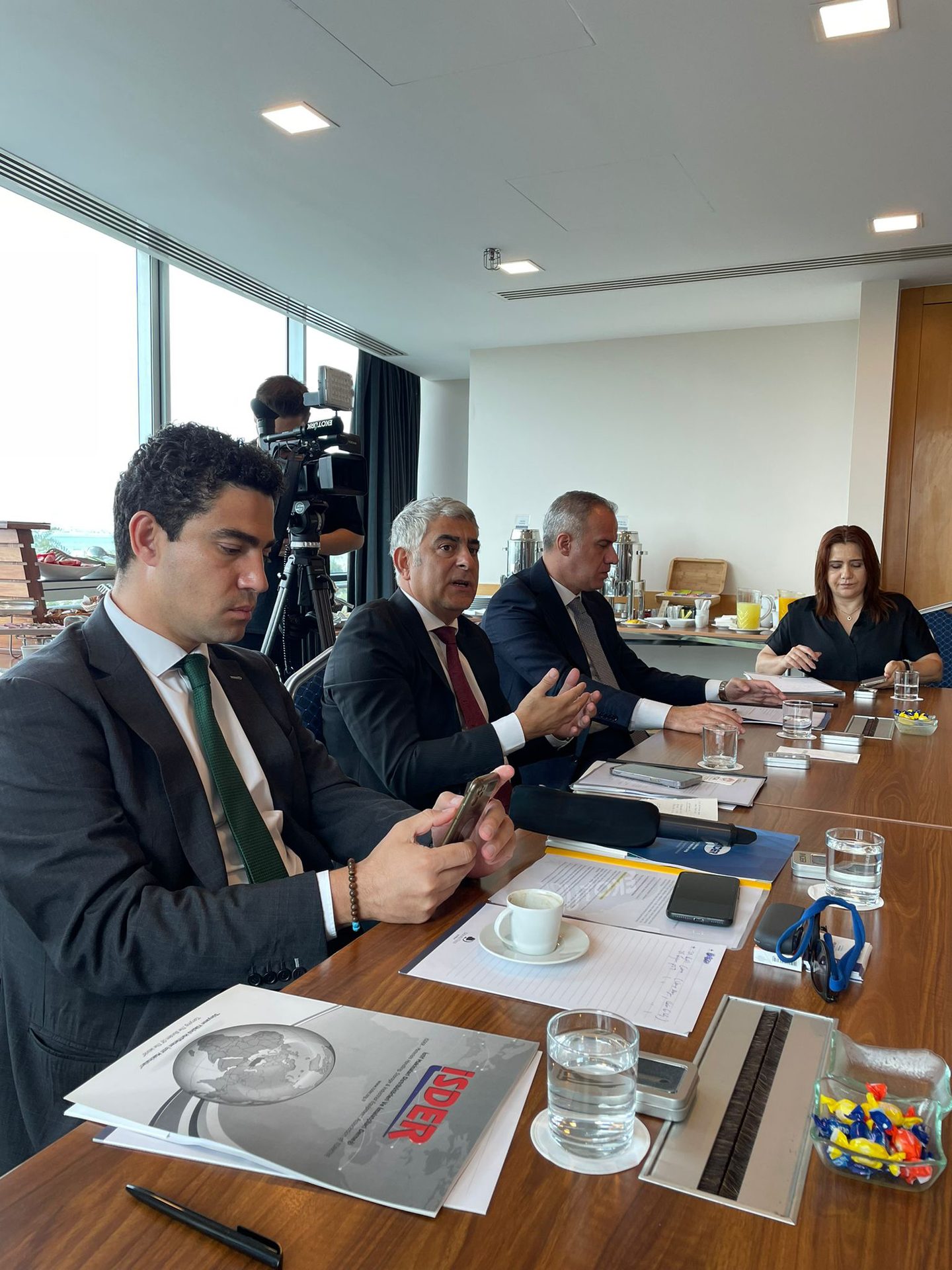 Conference room table, Tableware, Chair, Tie, Desk