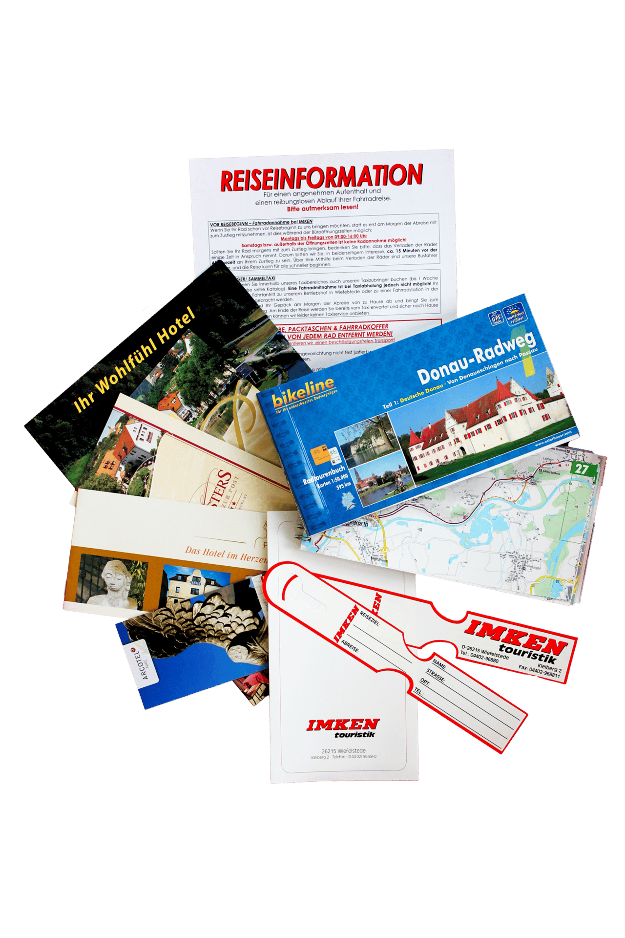 Various travel documents: 'Reiseinformation' guide, bicycle tour map, hotel brochures, luggage tags.