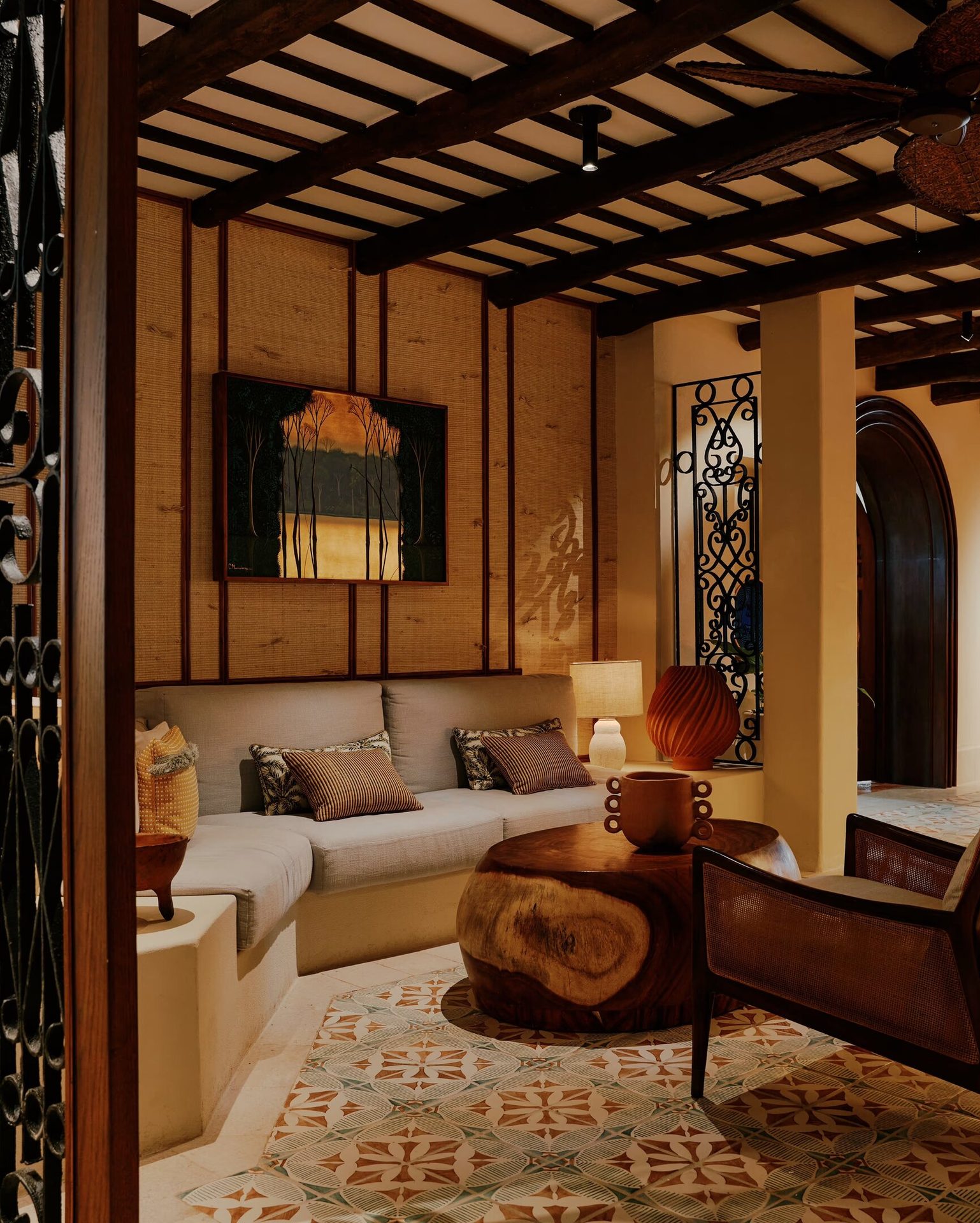 Interior design, Living room, Furniture, Property, Wood, Comfort, Lighting, Shade, Floor, Table